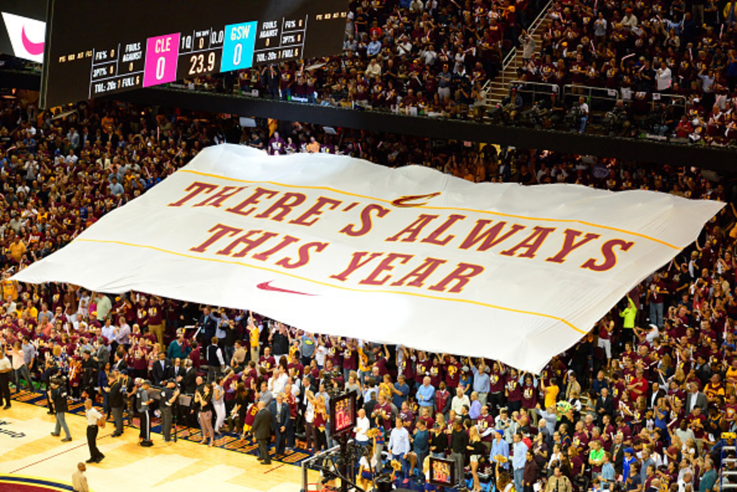 CLEVELAND, OH - JUNE 9: Fans passes a banner prior to the game of the Golden State Warriors against the Cleveland Cavaliers in Game Three of the 2015 NBA Finals on June 9, 2015 at Quicken Loans Arena in Cleveland, Ohio. NOTE TO USER: User expressly acknow