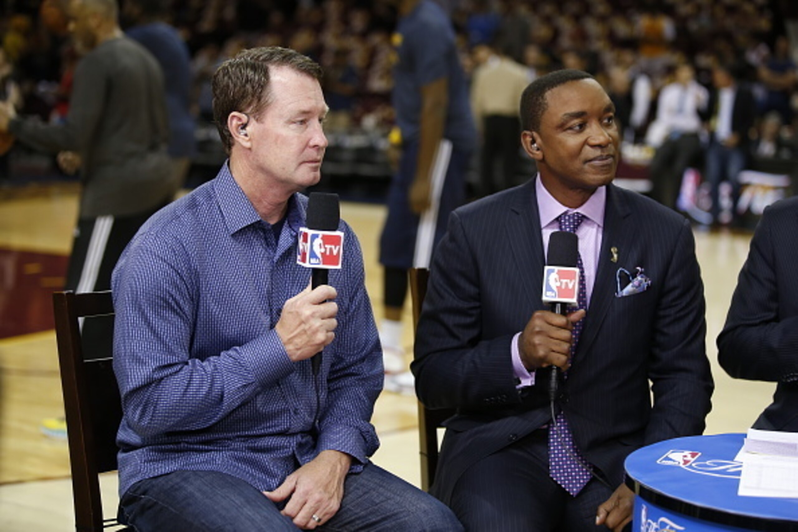 CLEVELAND, OH - JUNE 9:  NBATV broadcaster Isiah Thomas speaks with Mark Price before Game Three of the 2015 NBA Finals between the Golden State Warriors and the Cleveland Cavaliers on June 9, 2015 at Quicken Loans Arena in Cleveland, Ohio. NOTE TO USER: 
