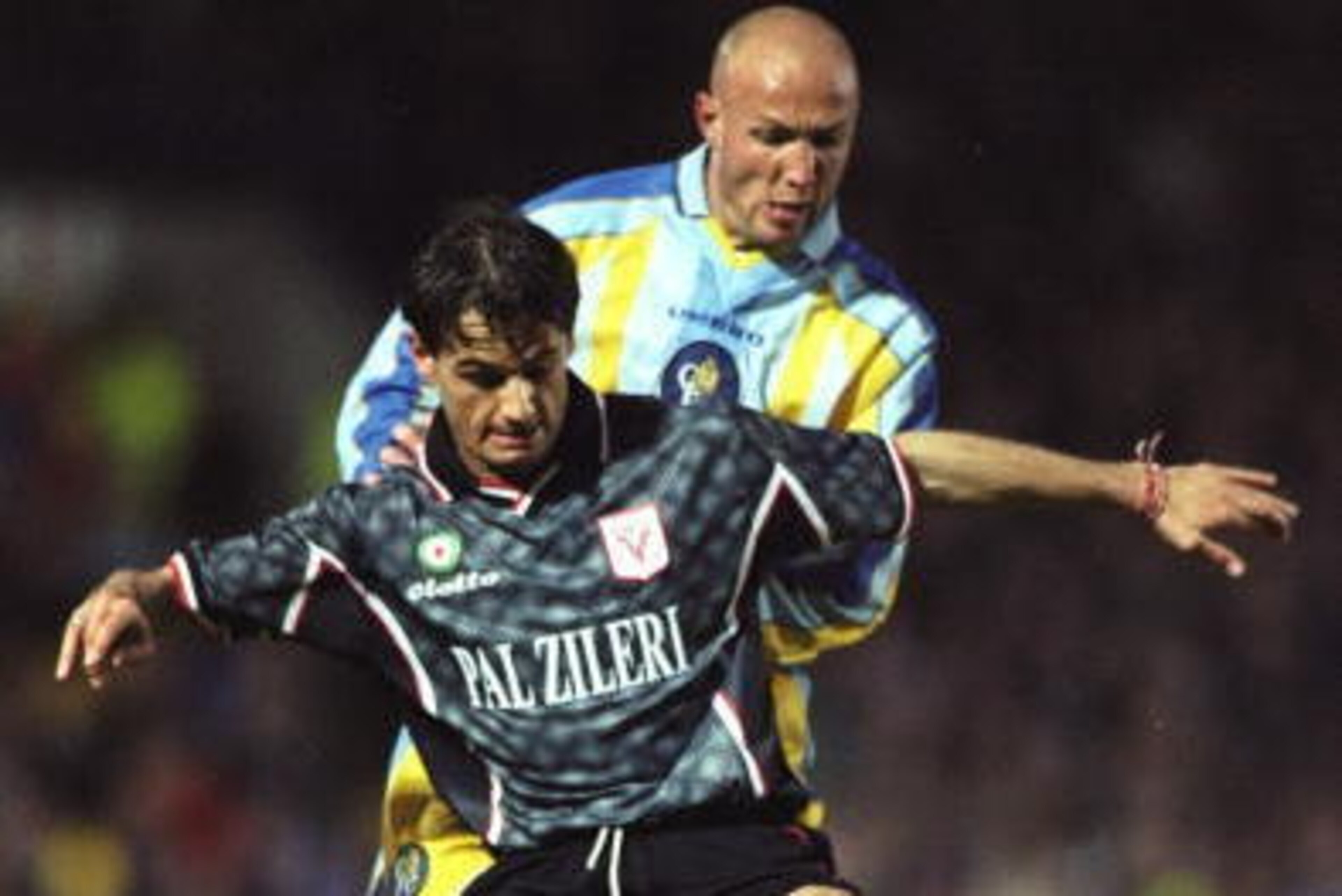 16 Apr 1998:  Gabriele Ambrosetti of Vicenza fends off Frank Leboeuf of Chelsea during the match between Chelsea v Vicenza in the European Cup Winners'' Cup Semi-final played at Stamford Bridge, London, England. Chelsea won the match 3-1 to go into the Fi