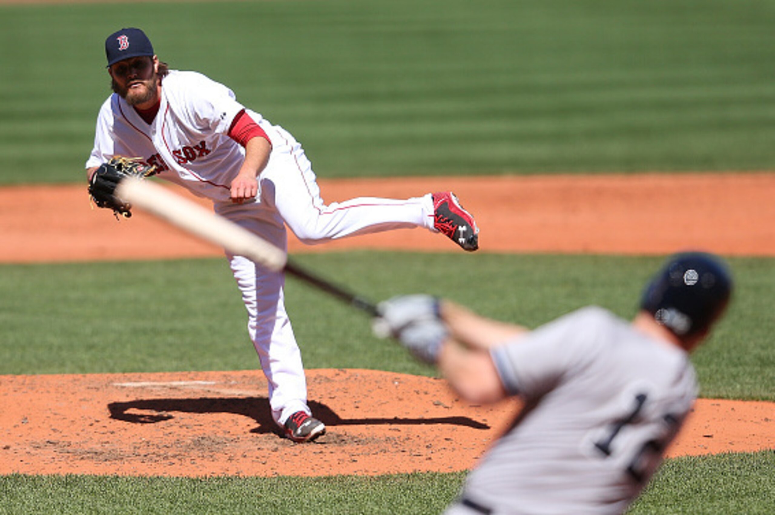 BOSTON, MA - MAY 2: Wade Miley #20 of the Boston Red Sox throws against Chase Headley #12 of the New York Yankees in the fourth inning at Fenway Park May 2, 2015 in Boston, Massachusetts.  (Photo by Jim Rogash/Getty Images)