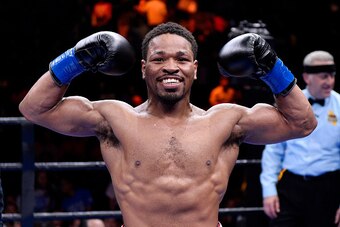 ONTARIO, CA - MARCH 13:  Shawn Porter celebrates after knocking out Erick Bone during their 12 round welterweight bout at Citizens Business Bank Arena March 13, 2015 in Ontario, California. (Photo by Kevork Djansezian/Getty Images)