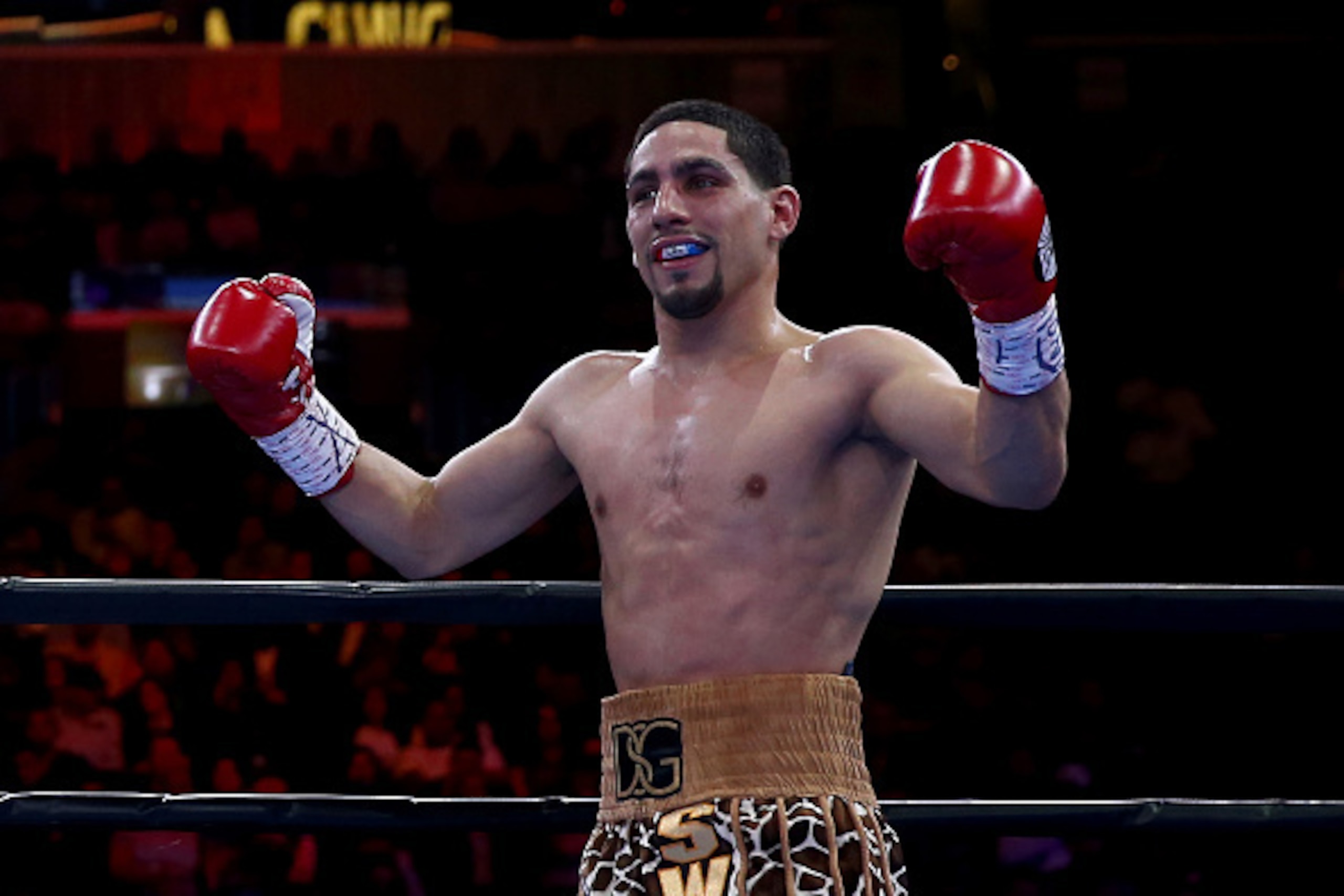 NEW YORK, NY - APRIL 11:  Danny Garcia reacts during his fight with Lamont Peterson during the Premier Boxing Champions Middleweight bout at Barclays Center on April 11, 2015 in the Brooklyn borough of  New York City.  (Photo by Elsa/Getty Images)