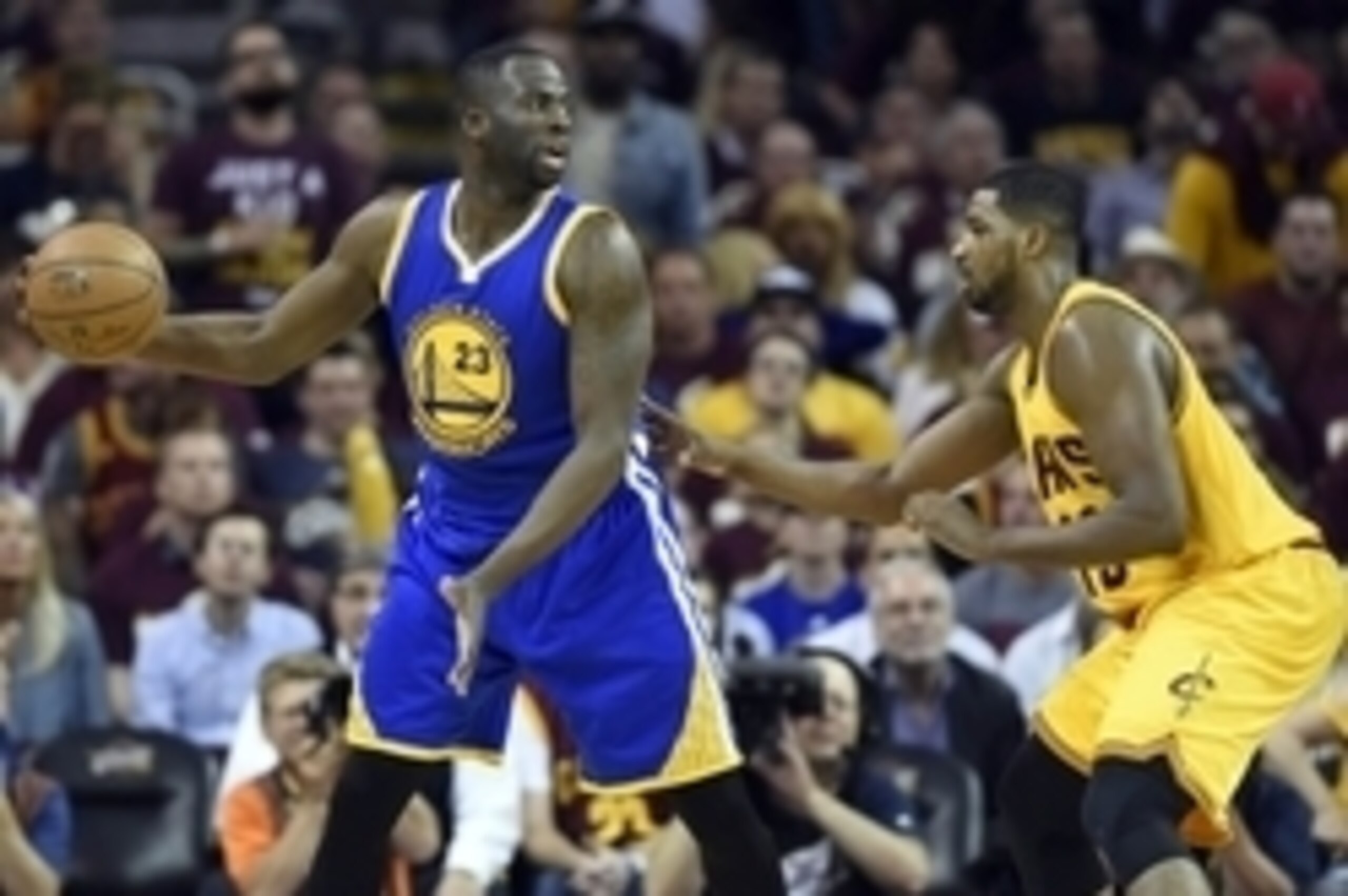 Jun 9, 2015; Cleveland, OH, USA; Golden State Warriors forward Draymond Green (23) handles the ball against Cleveland Cavaliers center Tristan Thompson (13) during the third quarter in game three of the NBA Finals at Quicken Loans Arena. Mandatory Credit: Jun 9, 2015; Cleveland, OH, USA; Golden State Warriors forward Draymond Green (23) handles the ball against Cleveland Cavaliers center Tristan Thompson (13) during the third quarter in game three of the NBA Finals at Quicken Loans Arena. Mandatory Credit: