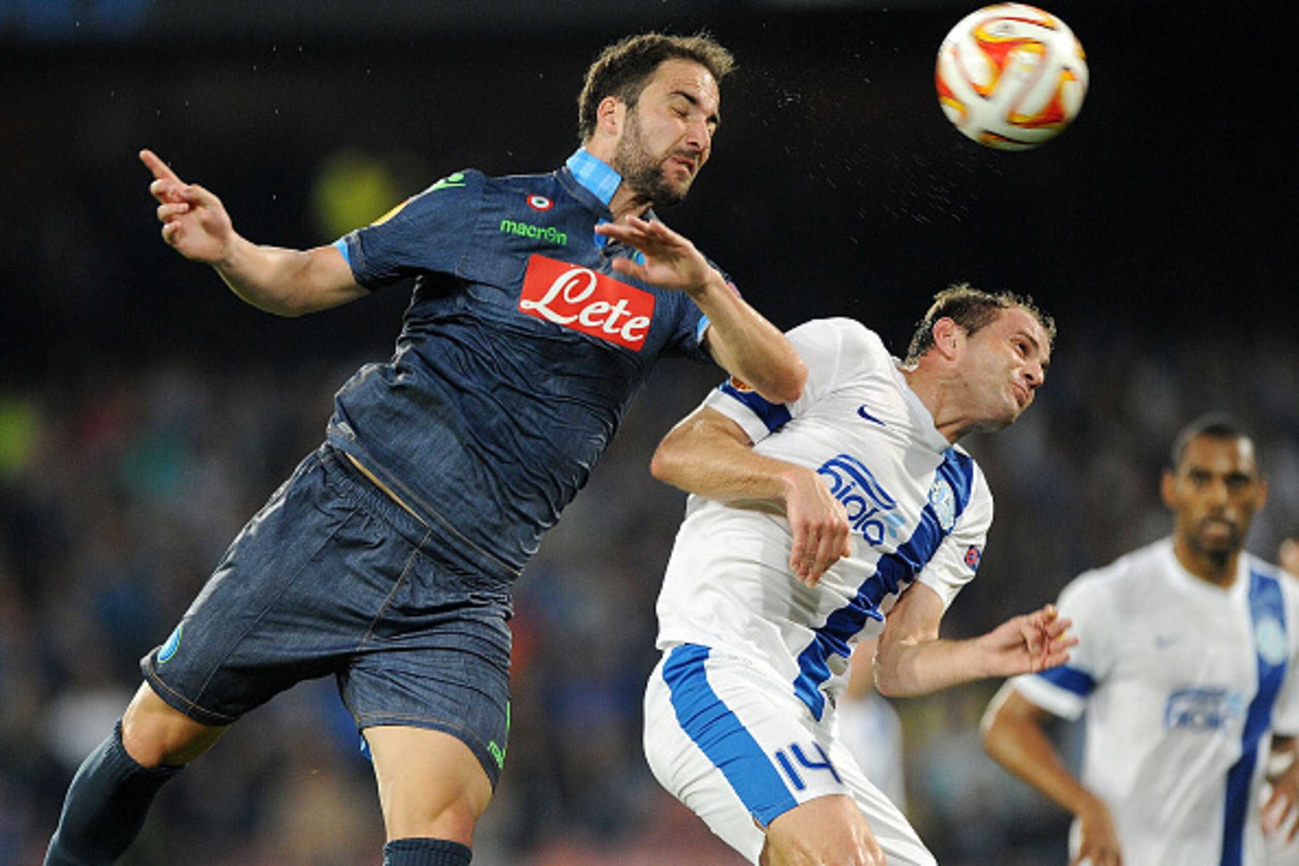 NAPLES, ITALY - MAY 7: Napoli's player Gonzalo Higuain vies with FC Dnipro Dnipropetrovsk player Yevhen Cheberyachko during the UEFA Europa League Semi Final between SSC Napoli and FC Dnipro Dnipropetrovsk on May 7, 2015 in Naples, Italy.  (Photo by Franc
