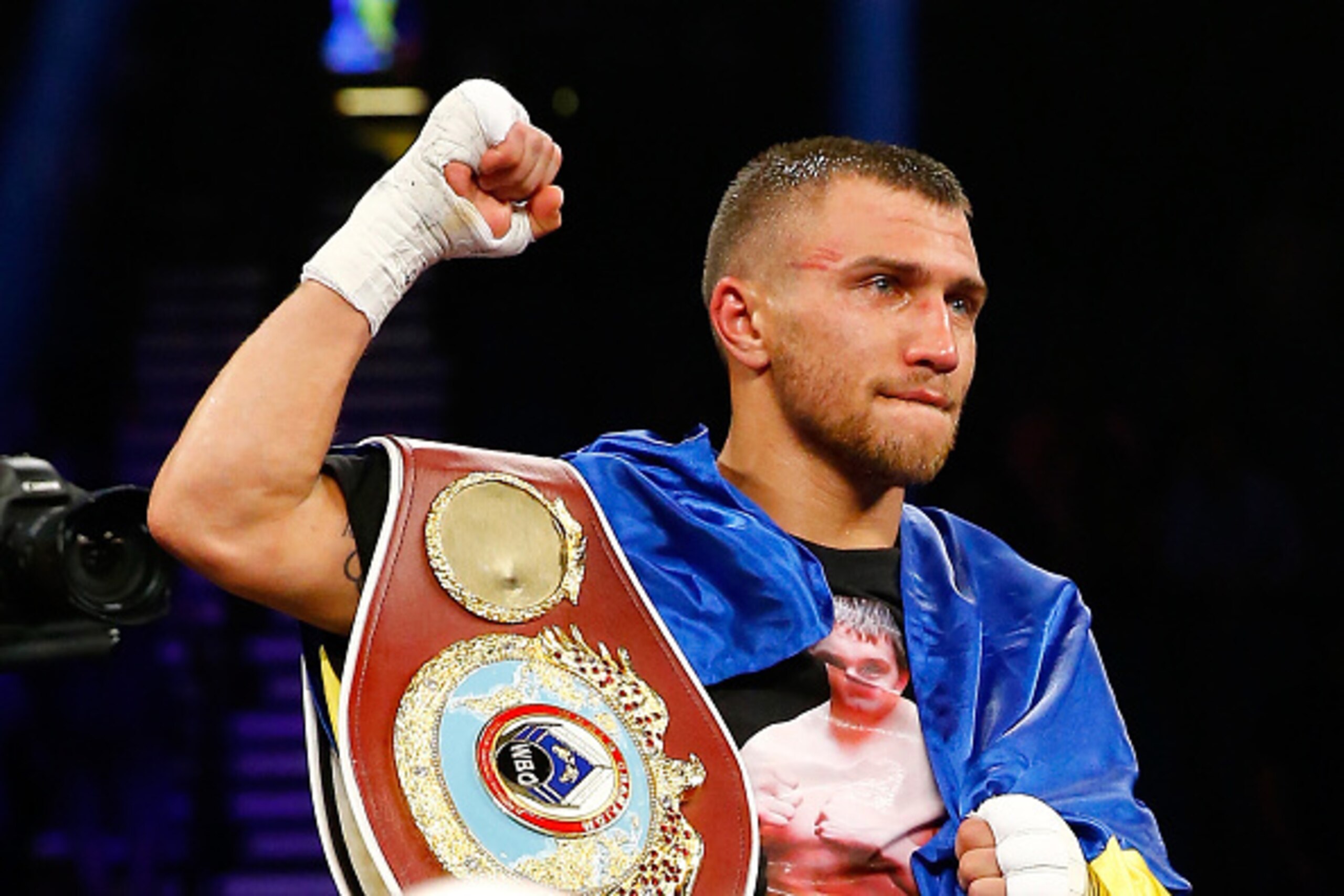 LAS VEGAS, NV - MAY 02:  Vasyl Lomachenko celebrates his 9th round knockout of Gamalier Rodriguez during their WBO featherweight championship bout on May 2, 2015 at MGM Grand Garden Arena in Las Vegas, Nevada.  (Photo by Al Bello/Getty Images)