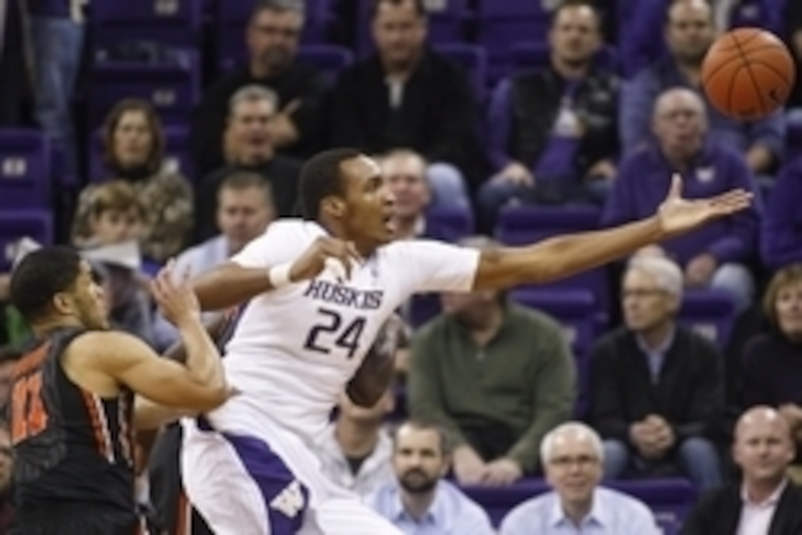 Jan 15, 2015; Seattle, WA, USA; Washington Huskies center Robert Upshaw (24) grabs a loose ball against the Oregon State Beavers during the first half at Alaska Airlines Arena. Mandatory Credit: Joe Nicholson-USA TODAY Sports