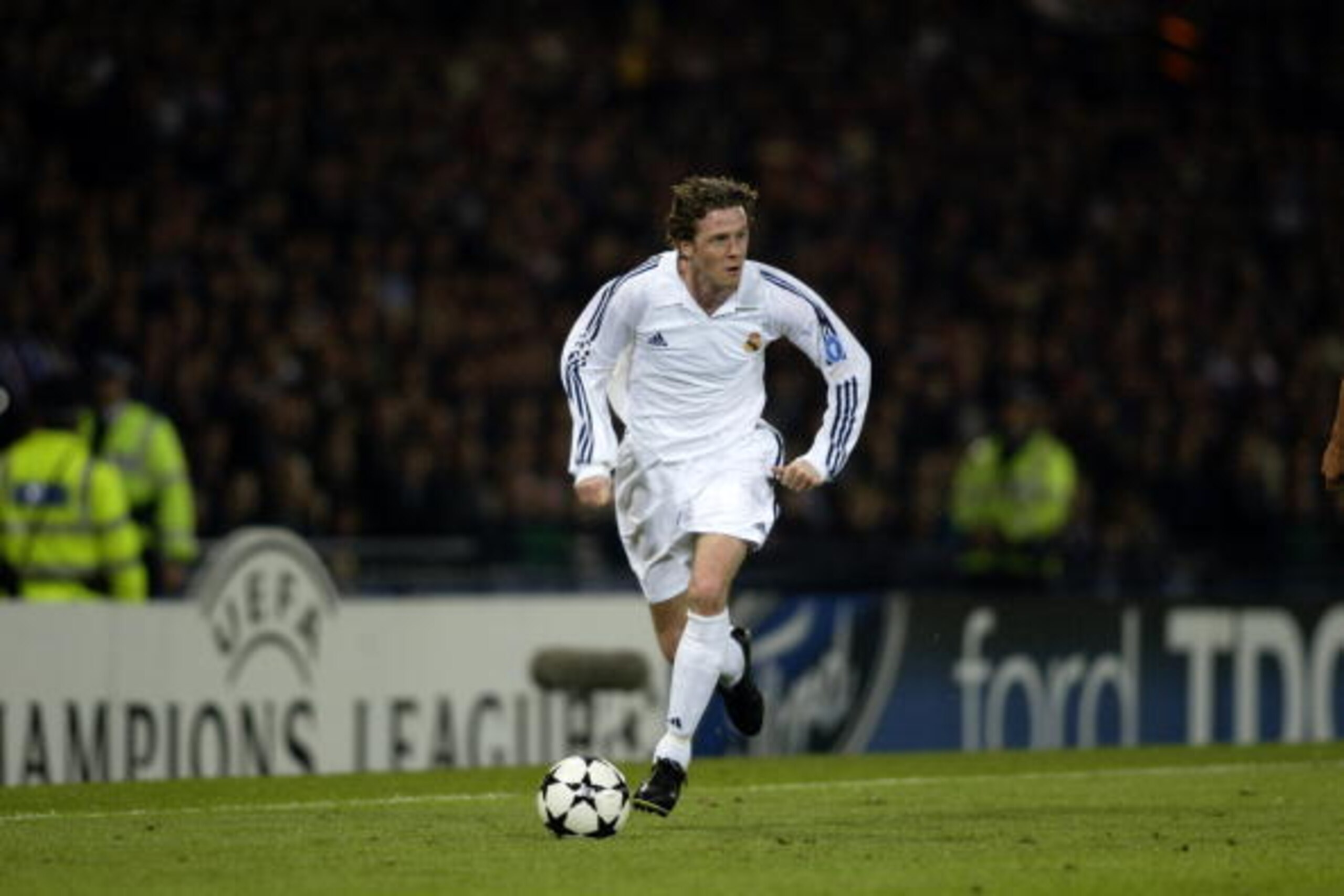 GLASGOW - May 15:  Steve McManaman of Real Madrid runs with the ball during the UEFA Champions League Final between Real Madrid and Bayer Leverkusen played at Hampden Park, in Glasgow, Scotland on May 15, 2002. Real Madrid won the match and cup 2-1. DIGIT