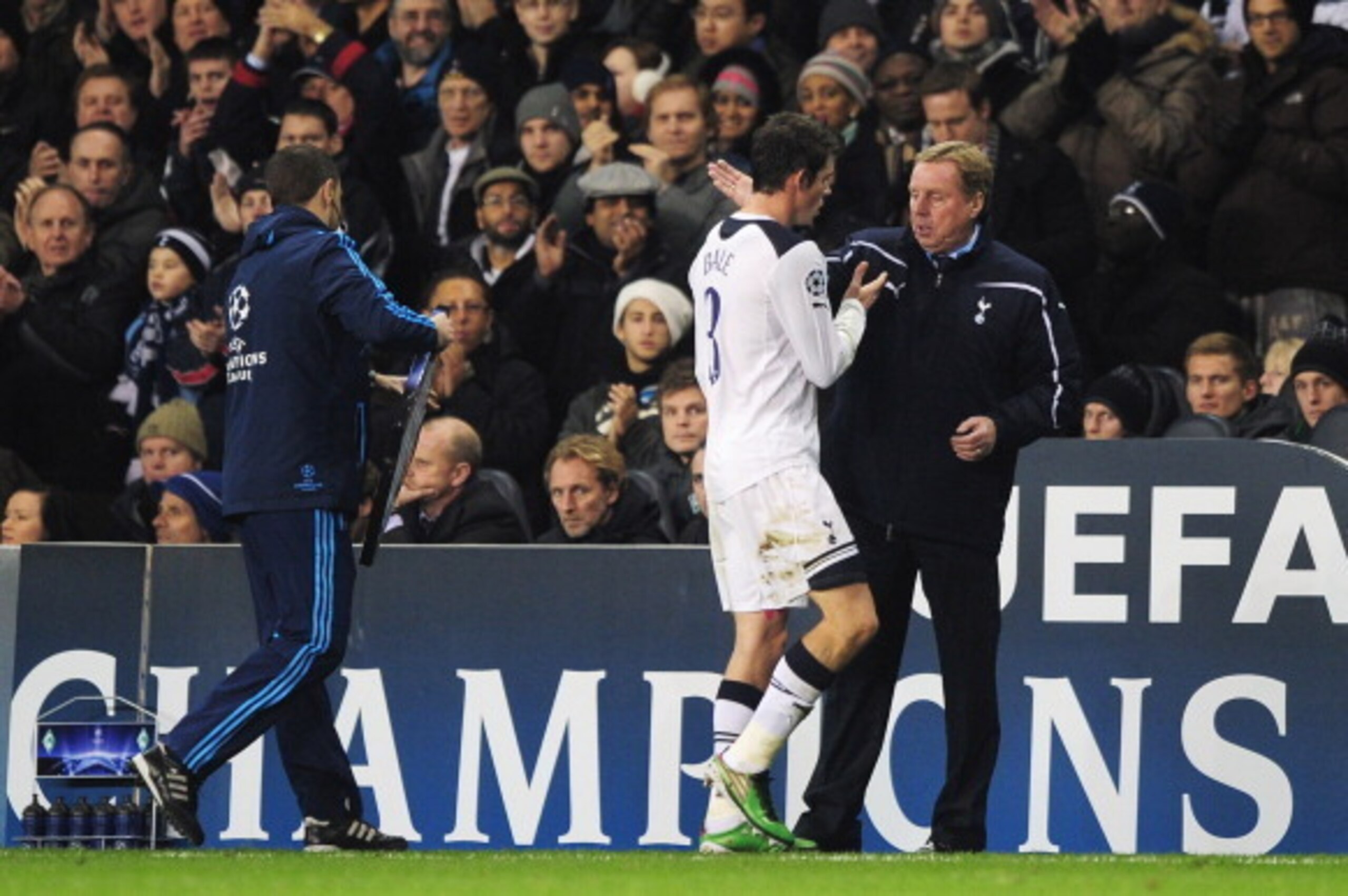 LONDON, ENGLAND - NOVEMBER 24:  Harry Redknapp, manager of Tottenham Hotspur congratulates Gareth Bale of Tottenham Hotspur as he is substituted during the UEFA Champions League Group A match between Tottenham Hotspur and SV Werder Bremen at White Hart La