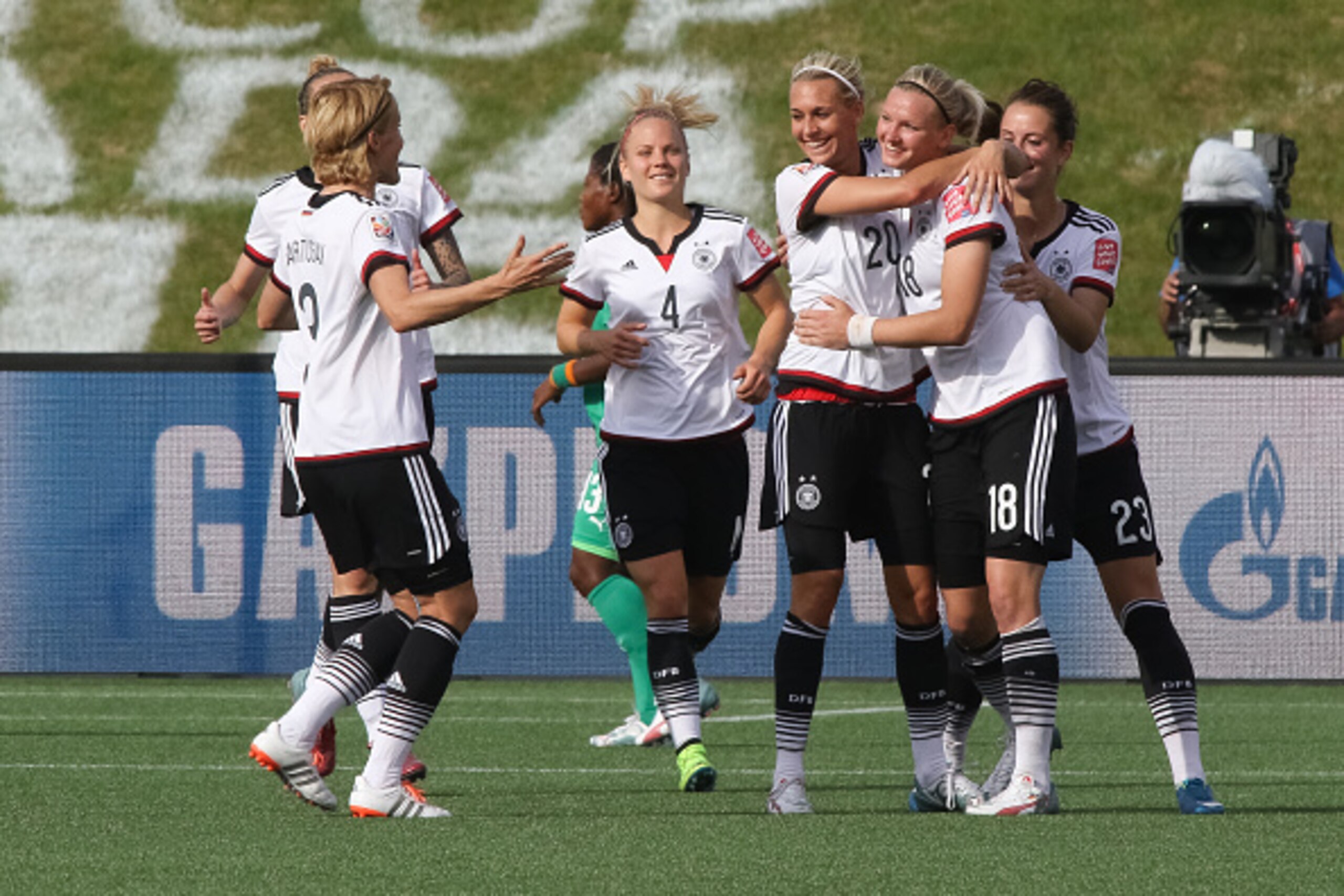 OTTAWA, ON - JUNE 7: Alexandra Popp #18 of Germany celebrates a goal with teammate Lena Goessling #20 during the FIFA Women's World Cup Canada 2015 Group B match between Germany and Cote d'Ivoire at Lansdowne Stadium on June 7, 2015 in Ottawa, Canada.  (P