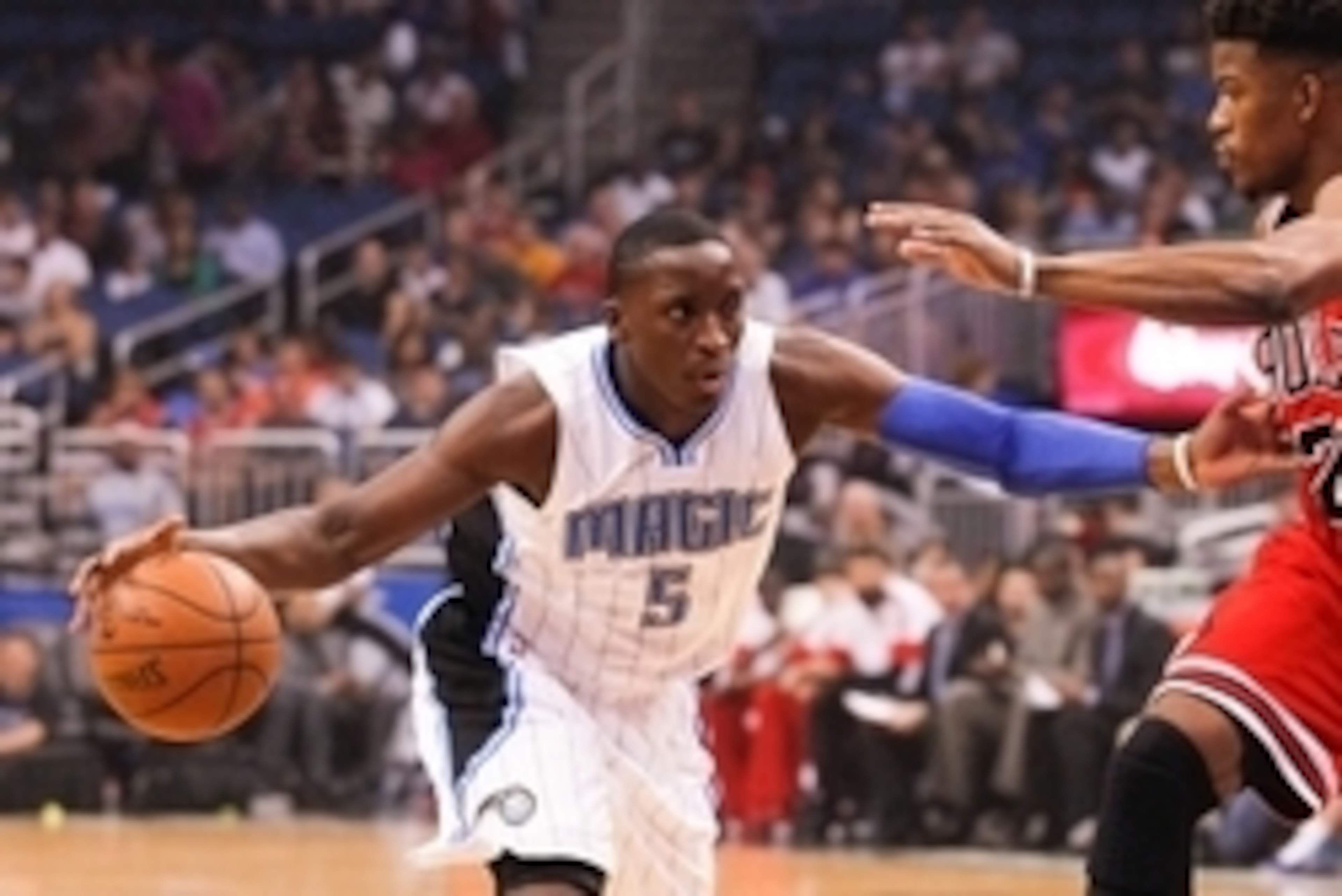 Apr 8, 2015; Orlando, FL, USA; Orlando Magic guard Victor Oladipo (5) drives the ball past during an NBA basketball game at Amway Center. The Orlando Magic beat the Chicago Bulls 105-103. Mandatory Credit: Reinhold Matay-USA TODAY Sports