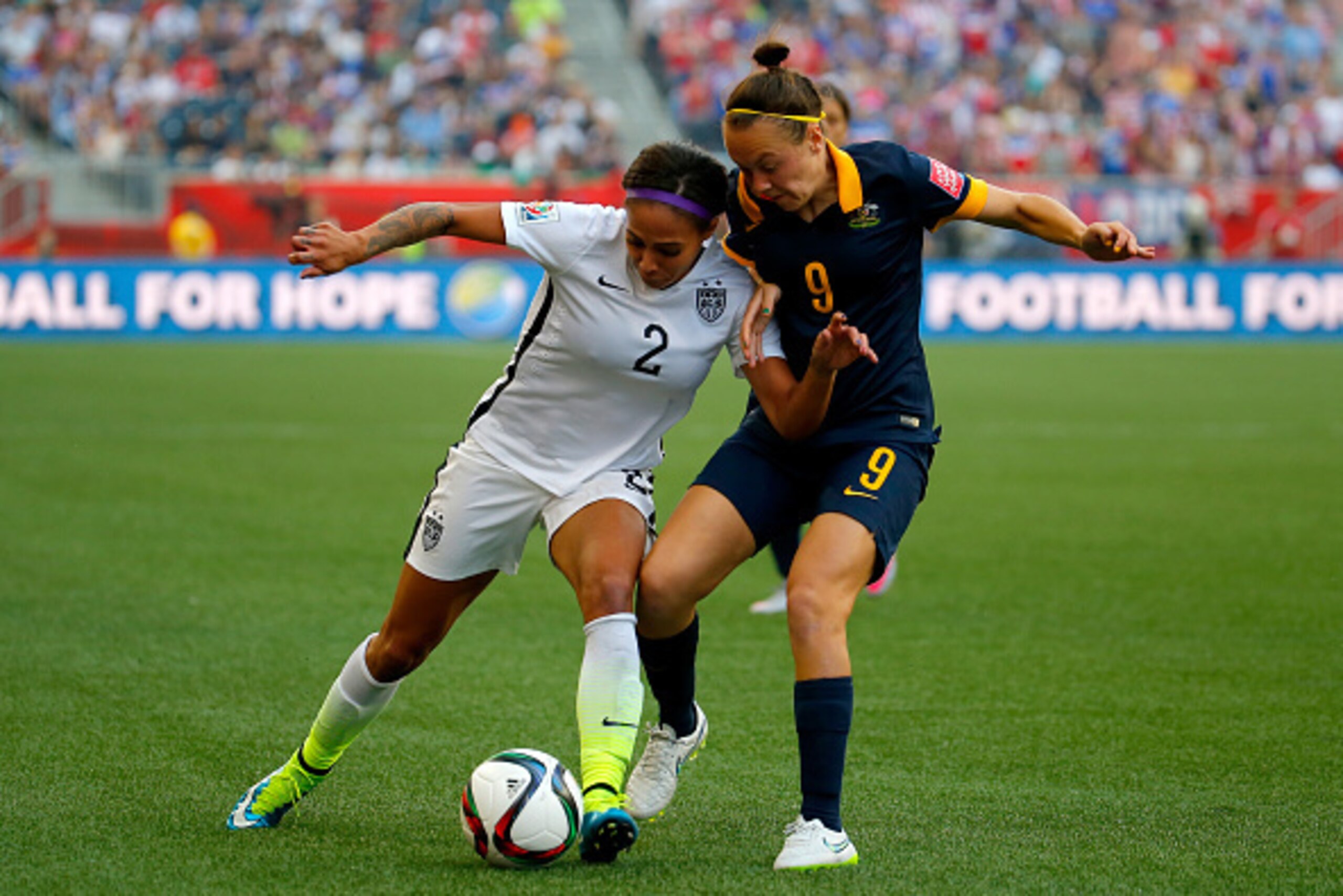 WINNIPEG, MB - JUNE 08: Sydney Leroux #2 of United States with the ball against Caitlin Foord #9 of Australia in the second half during the FIFA Women's World Cup 2015 Group D match at Winnipeg Stadium on June 8, 2015 in Winnipeg, Canada. (Photo by Kevi WINNIPEG, MB - JUNE 08: Sydney Leroux #2 of United States with the ball against Caitlin Foord #9 of Australia in the second half during the FIFA Women's World Cup 2015 Group D match at Winnipeg Stadium on June 8, 2015 in Winnipeg, Canada. (Photo by Kevi