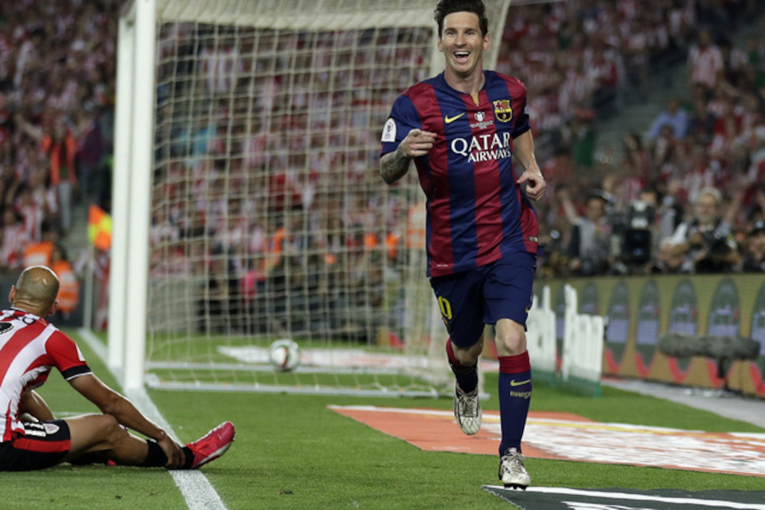 Lionel Messi celebrates his spectacular goal in the Copa del Rey final against Athletic Bilbao.