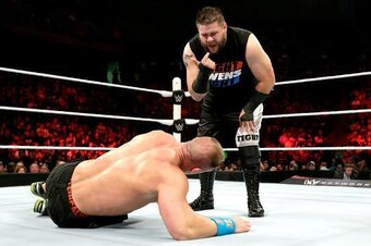 Kevin Owens taunts John Cena.