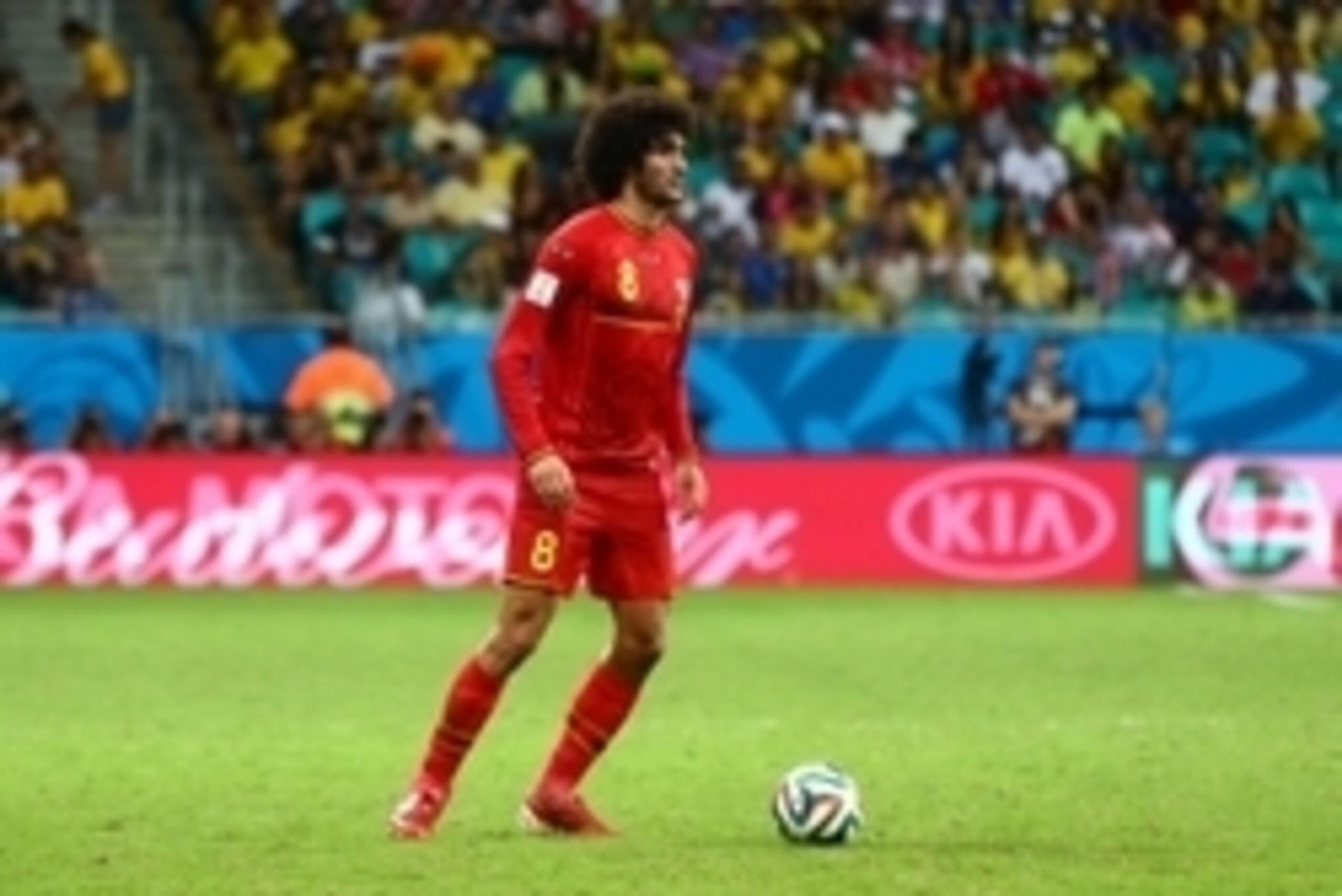 Jul 1, 2014; Salvador, BRAZIL; Belgium midfielder Marouane Fellaini (8) against USA during the round of sixteen match in the 2014 World Cup at Arena Fonte Nova. Belgium defeated USA 2-1 in overtime. Mandatory Credit: Mark J. Rebilas-USA TODAY Sports