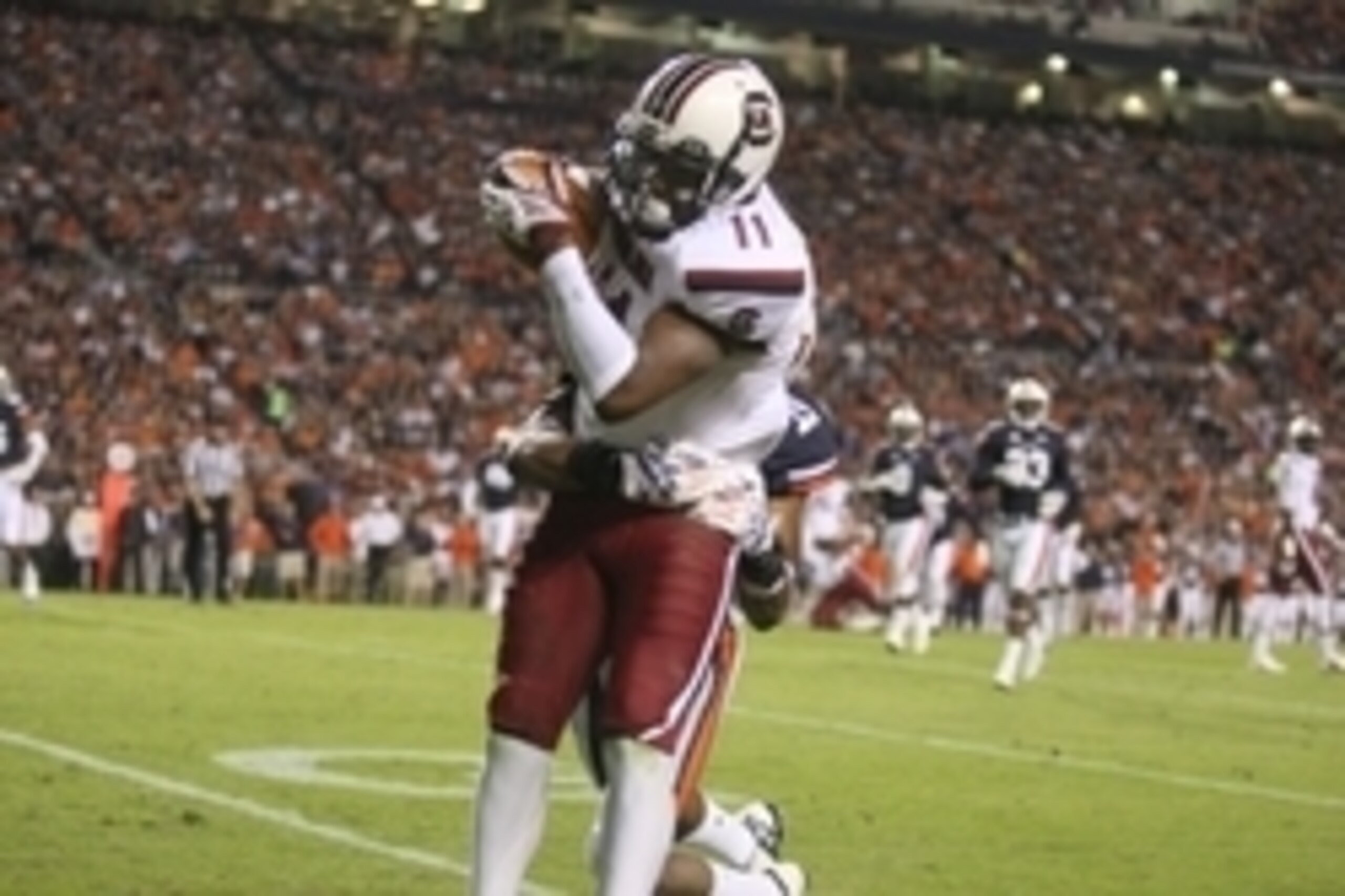 Oct 25, 2014; Auburn, AL, USA; South Carolina Gamecocks receiver Pharoh Cooper (11) catches a touchdown over Auburn Tigers defensive back Nick Ruffin (19) during the first half at Jordan Hare Stadium. Mandatory Credit: John Reed-USA TODAY Sports