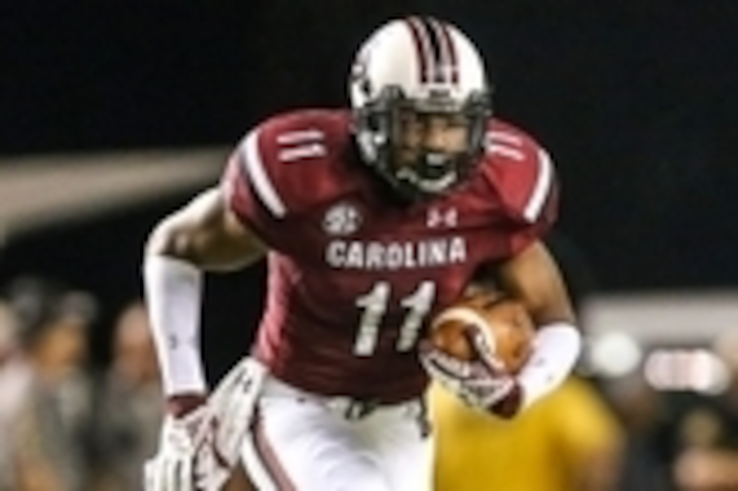 Sep 27, 2014; Columbia, SC, USA; South Carolina Gamecocks wide receiver Pharoh Cooper (11) gains yards after the catch  during the fourth quarter at Williams-Brice Stadium. Missouri wins in the final minutes 21-20 over South Carolina. Mandatory Credit: Ji