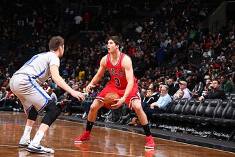 BROOKLYN, NY - NOVEMBER 30:  Doug McDermott #3 of the Chicago Bulls handles the ball against the Brooklyn Nets during the game on November 30, 2014 at Barclays Center in Brooklyn, New York. NOTE TO USER: User expressly acknowledges and agrees that, by dow