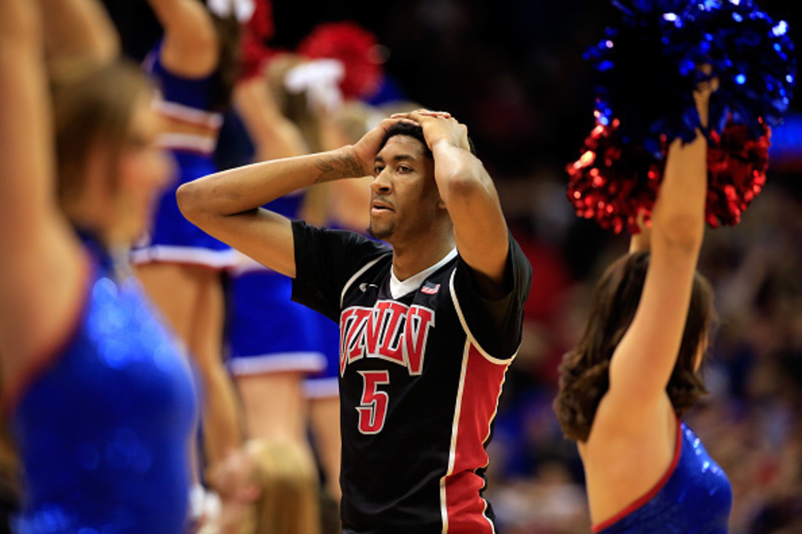 LAWRENCE, KS - JANUARY 04:  Christian Wood #5 of the UNLV Rebels walks off the court after the Kansas Jayhawks defeated the Rebels 76-61 to win the game at Allen Fieldhouse on January 4, 2015 in Lawrence, Kansas.  (Photo by Jamie Squire/Getty Images)