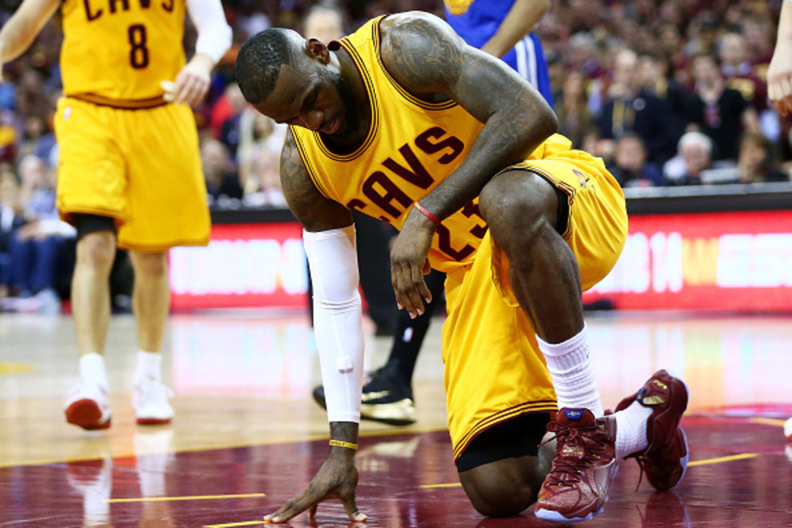 CLEVELAND, OH - JUNE 11:  LeBron James #23 of the Cleveland Cavaliers gets up after falling to the court in the third quarter against the Golden State Warriors during Game Four of the 2015 NBA Finals at Quicken Loans Arena on June 11, 2015 in Cleveland, O