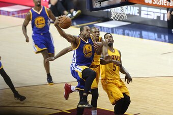 CLEVELAND, OH - JUNE 11: Andre Iguodala #9 of the Golden State Warriors shoots against the Cleveland Cavaliers in Game Four of the 2015 NBA Finals on June 11, 2015 at Quicken Loans Arena in Cleveland, Ohio. NOTE TO USER: User expressly acknowledges and ag
