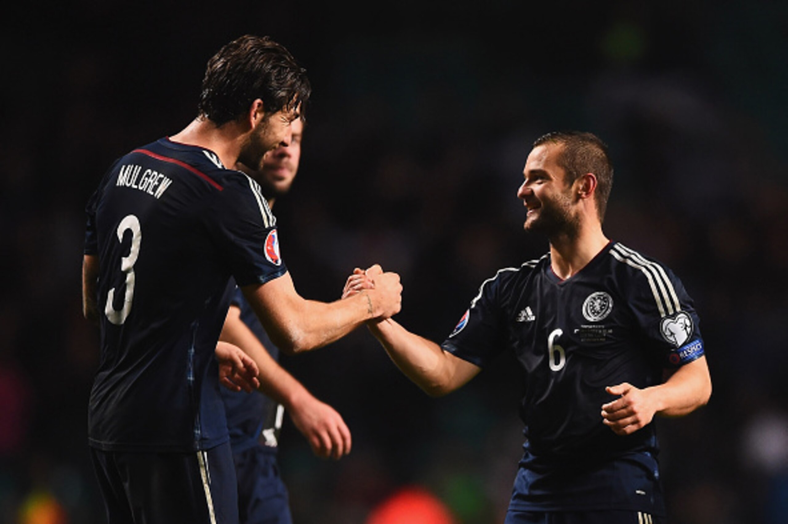 GLASGOW, SCOTLAND - NOVEMBER 14:  Charlie Mulgrew (3) and Shaun Maloney of Scotland (6) celebrate victory after the EURO 2016 Group D Qualifier match between Scotland and Republic of Ireland at Celtic Park on November 14, 2014 in Glasgow, Scotland.  (Phot