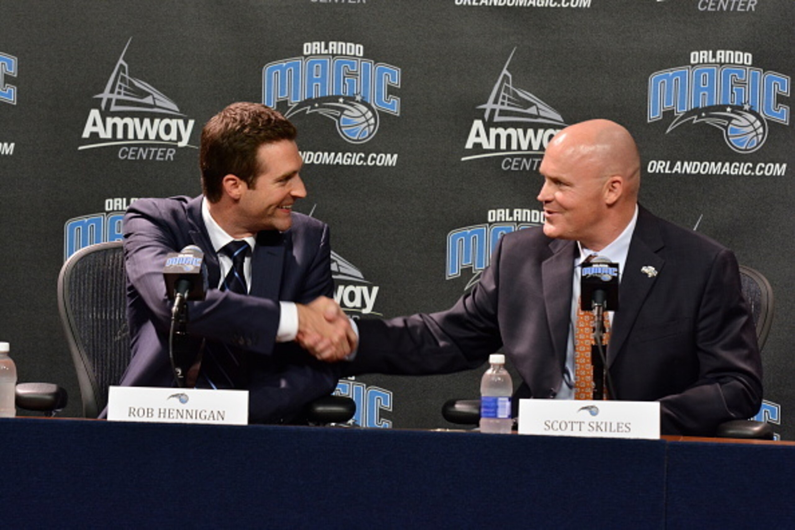 ORLANDO, FL - MAY 29: Orlando Magic General Manager Rob Hennigan introduce new Magic head coach Scott Skiles during a press conference on May 29, 2015 at Amway Center in Orlando, Florida. NOTE TO USER: User expressly acknowledges and agrees that, by down ORLANDO, FL - MAY 29: Orlando Magic General Manager Rob Hennigan introduce new Magic head coach Scott Skiles during a press conference on May 29, 2015 at Amway Center in Orlando, Florida. NOTE TO USER: User expressly acknowledges and agrees that, by down