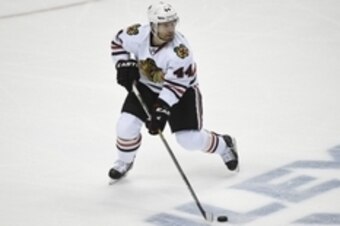 May 25, 2015; Anaheim, CA, USA; Chicago Blackhawks defenseman Kimmo Timonen (44) controls the puck against the Anaheim Ducks during the second period in game five of the Western Conference Final of the 2015 Stanley Cup Playoffs at Honda Center. Mandatory 