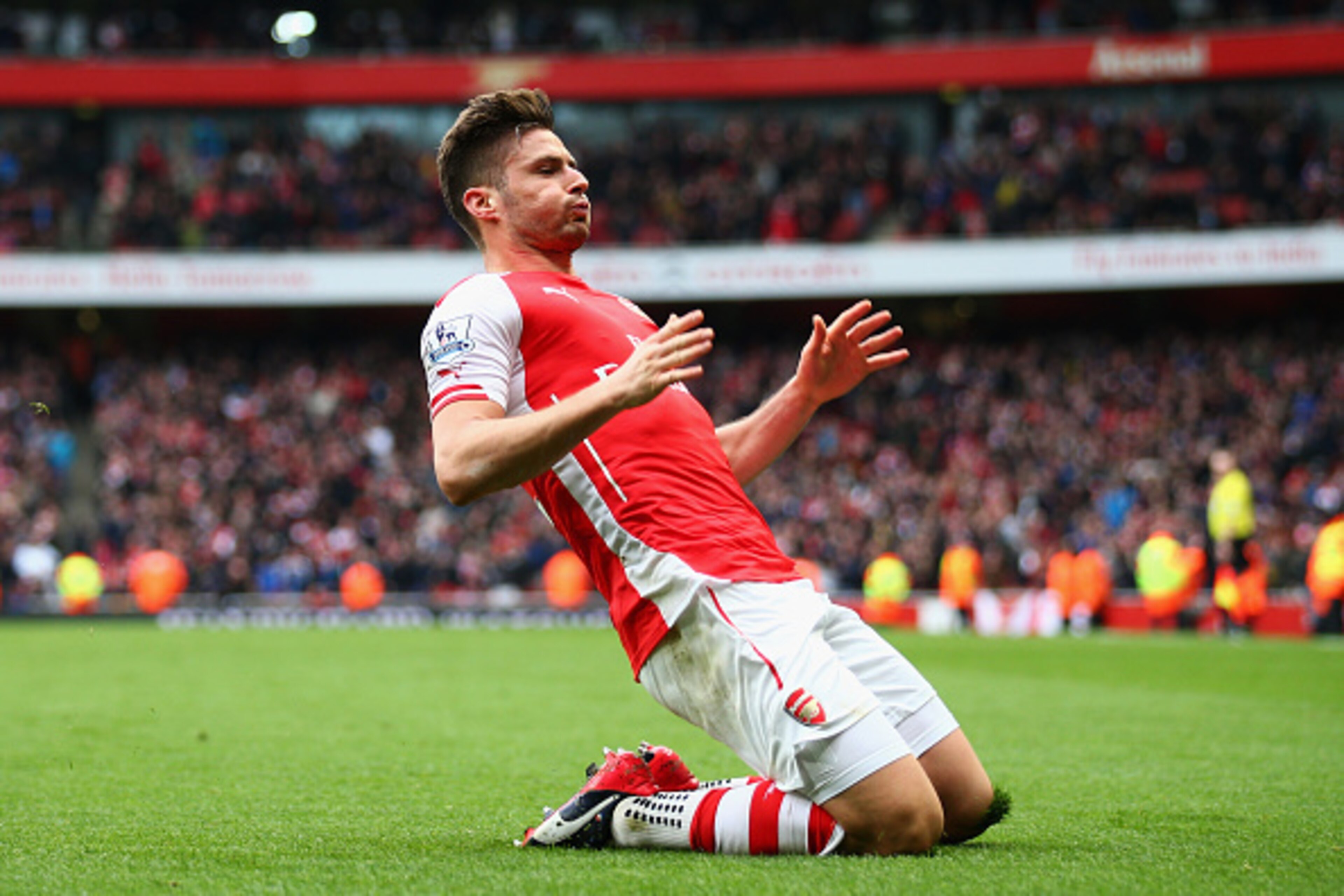 LONDON, ENGLAND - APRIL 04: Olivier Giroud of Arsenal celebrates after scoring his team's fourth goal during the Barclays Premier League match between Arsenal and Liverpool at Emirates Stadium on April 4, 2015 in London, England. (Photo by Paul Gilham/G LONDON, ENGLAND - APRIL 04: Olivier Giroud of Arsenal celebrates after scoring his team's fourth goal during the Barclays Premier League match between Arsenal and Liverpool at Emirates Stadium on April 4, 2015 in London, England. (Photo by Paul Gilham/G