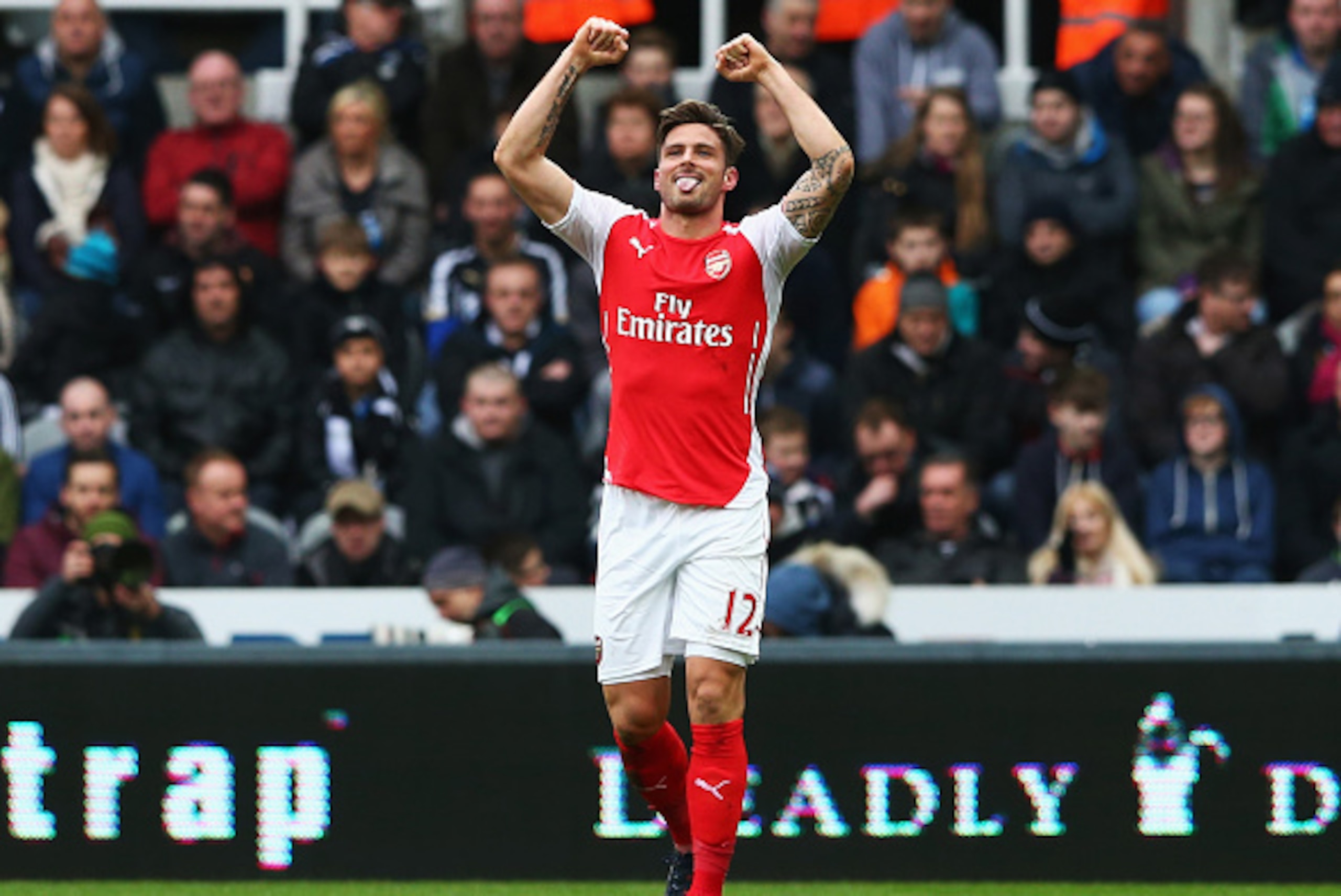 NEWCASTLE UPON TYNE, ENGLAND - MARCH 21: Olivier Giroud of Arsenal celebrates scoring his opening goal during the Barclays Premier League match between Newcastle United and Arsenal at St James' Park on March 21, 2015 in Newcastle upon Tyne, England.  (Pho