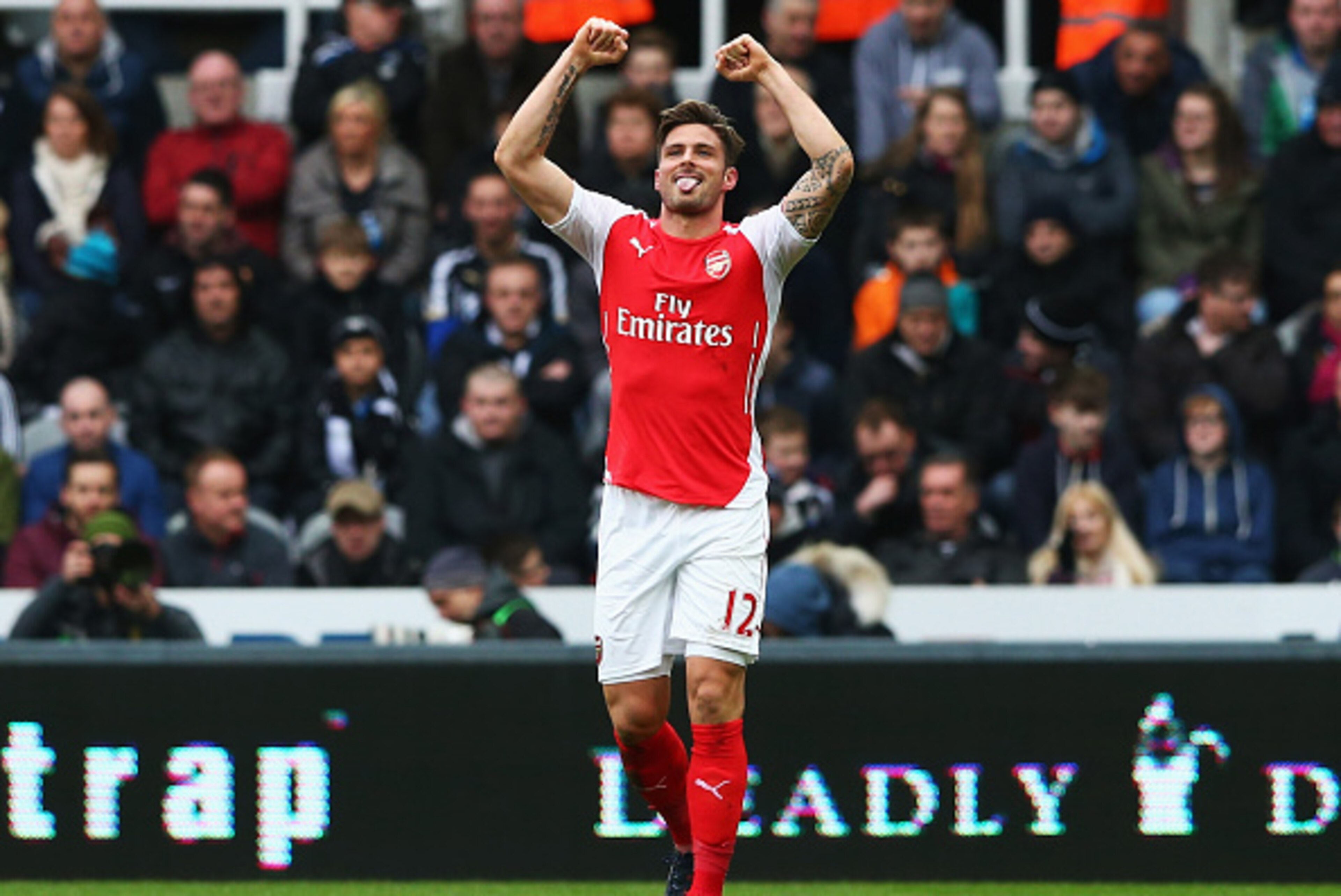 NEWCASTLE UPON TYNE, ENGLAND - MARCH 21: Olivier Giroud of Arsenal celebrates scoring his opening goal during the Barclays Premier League match between Newcastle United and Arsenal at St James' Park on March 21, 2015 in Newcastle upon Tyne, England. (Pho NEWCASTLE UPON TYNE, ENGLAND - MARCH 21: Olivier Giroud of Arsenal celebrates scoring his opening goal during the Barclays Premier League match between Newcastle United and Arsenal at St James' Park on March 21, 2015 in Newcastle upon Tyne, England. (Pho