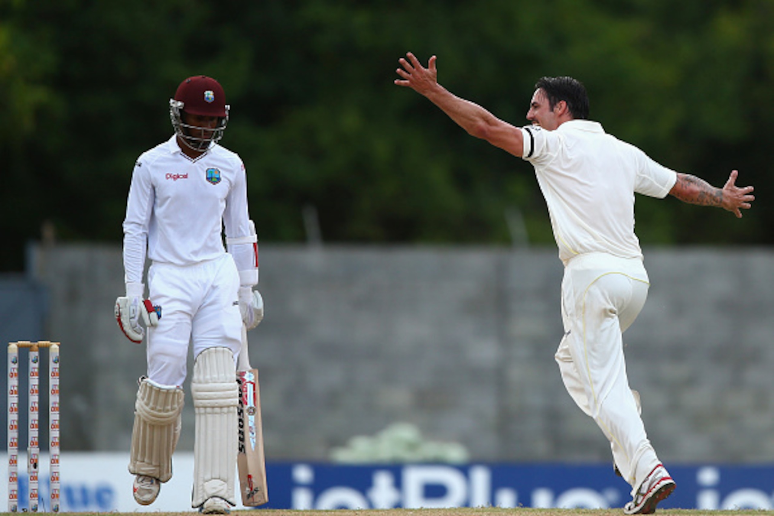 ROSEAU, DOMINICA - JUNE 04: Mitchell Johnson of Australia celebrates after taking the wicket of Shai Hope of West Indies during day two of the First Test match between Australia and the West Indies at Windsor Park on June 4, 2015 in Roseau, Dominica. (P ROSEAU, DOMINICA - JUNE 04: Mitchell Johnson of Australia celebrates after taking the wicket of Shai Hope of West Indies during day two of the First Test match between Australia and the West Indies at Windsor Park on June 4, 2015 in Roseau, Dominica. (P