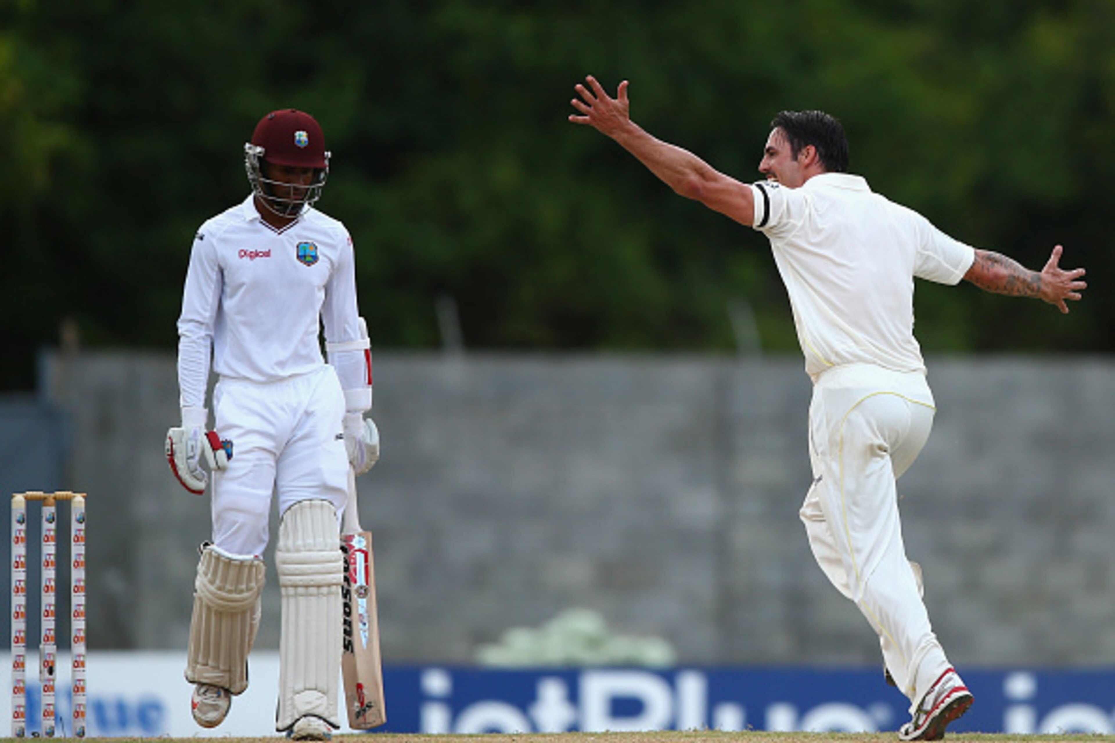 ROSEAU, DOMINICA - JUNE 04: Mitchell Johnson of Australia celebrates after taking the wicket of Shai Hope of West Indies during day two of the First Test match between Australia and the West Indies at Windsor Park on June 4, 2015 in Roseau, Dominica. (P ROSEAU, DOMINICA - JUNE 04: Mitchell Johnson of Australia celebrates after taking the wicket of Shai Hope of West Indies during day two of the First Test match between Australia and the West Indies at Windsor Park on June 4, 2015 in Roseau, Dominica. (P