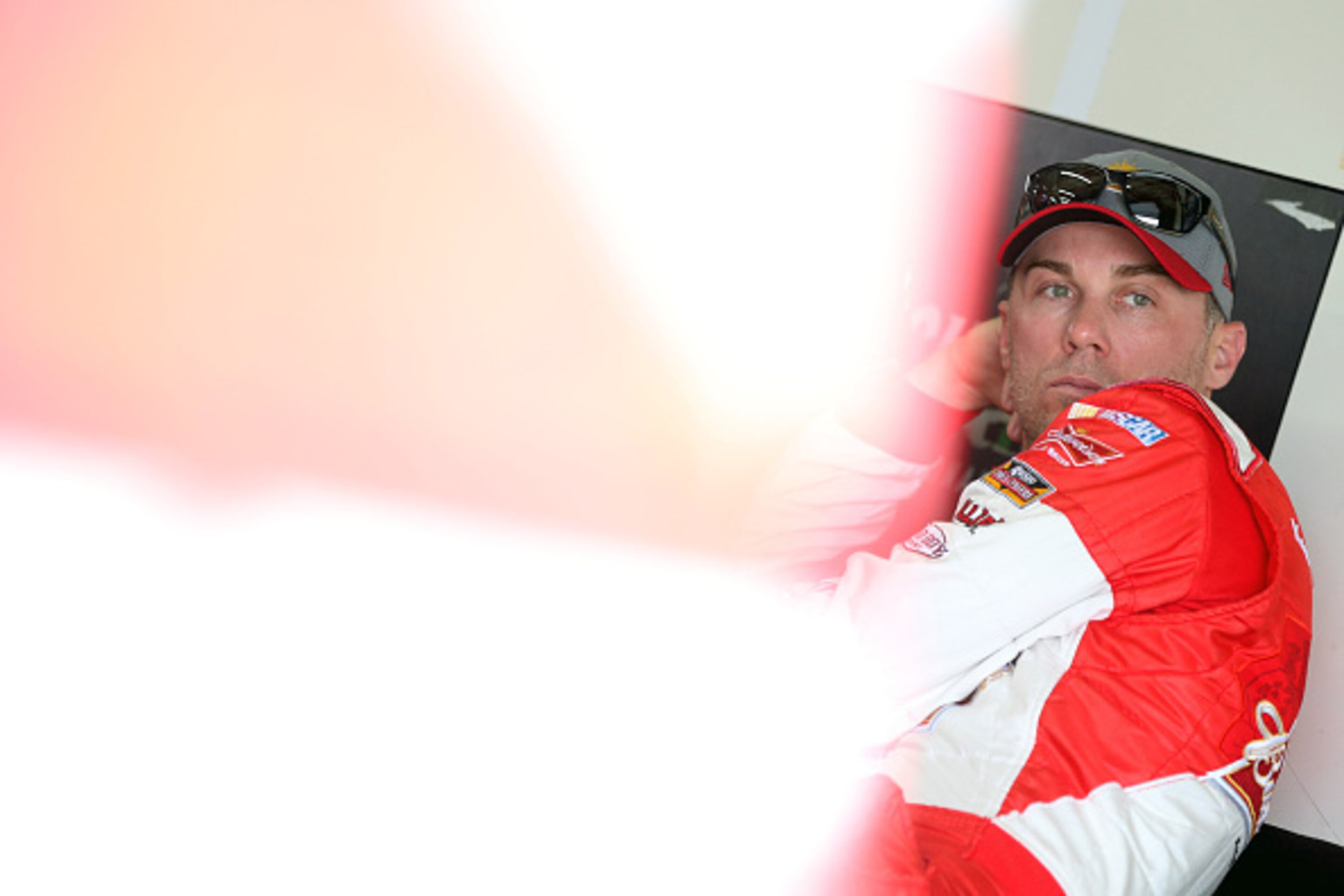 BROOKLYN, MI - JUNE 12:  Kevin Harvick, driver of the #4 Budweiser/Jimmy John's Chevrolet, looks on during practice for the NASCAR Sprint Cup Series Quicken Loans 400 at Michigan International Speedway on June 12, 2015 in Brooklyn, Michigan.  (Photo by Br