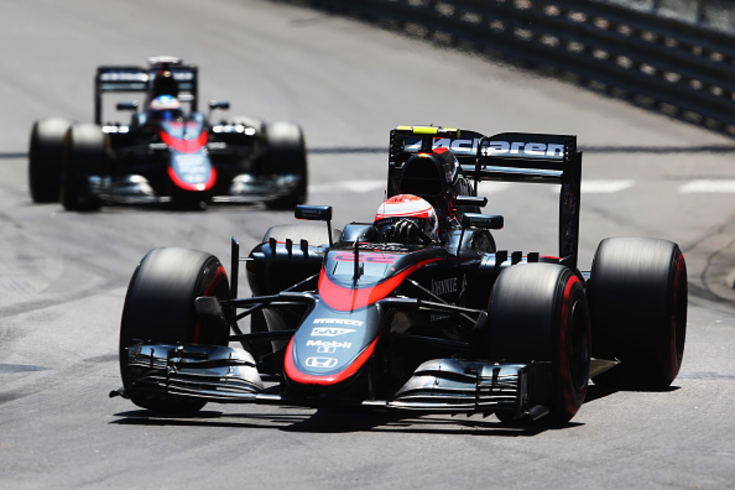 MONTE-CARLO, MONACO - MAY 24:  Jenson Button of Great Britain and McLaren Honda leads from team mate Fernando Alonso of Spain and McLaren Honda
on his way to scoring the first points for his team during the Monaco Formula One Grand Prix at Circuit de Mona