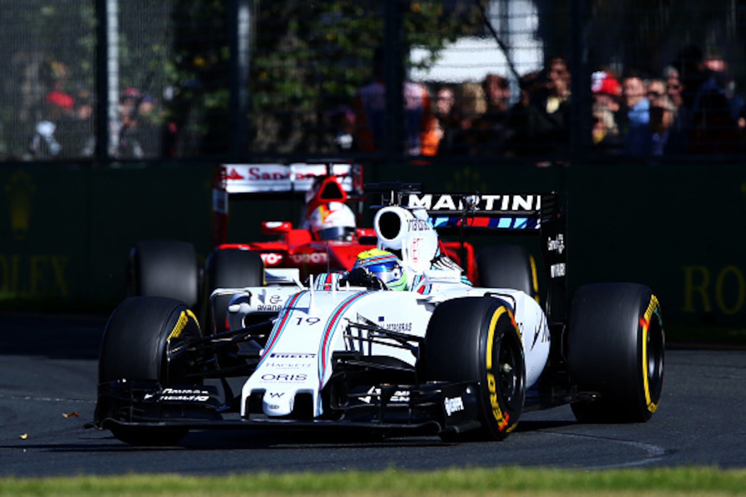MELBOURNE, AUSTRALIA - MARCH 15:  Felipe Massa of Brazil and Williams leads Sebastian Vettel of Germany and Ferrari during the Australian Formula One Grand Prix at Albert Park on March 15, 2015 in Melbourne, Australia.  (Photo by Robert Cianflone/Getty Im