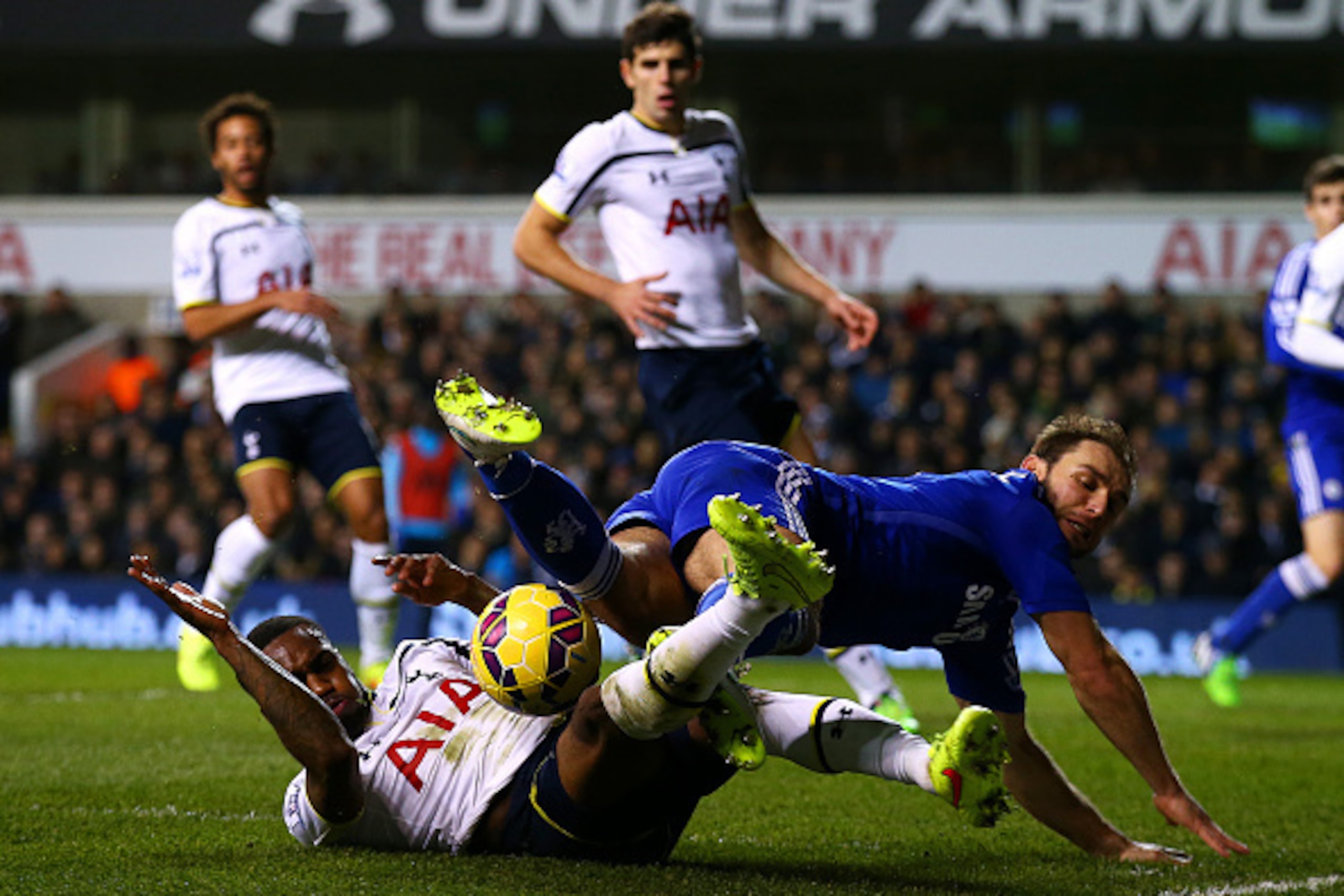 LONDON, ENGLAND - JANUARY 01:  Danny Rose of Spurs challenges Branislav Ivanovic of Chelsea during the Barclays Premier League match between Tottenham Hotspur and Chelsea at White Hart Lane on January 1, 2015 in London, England.  (Photo by Clive Rose/Gett