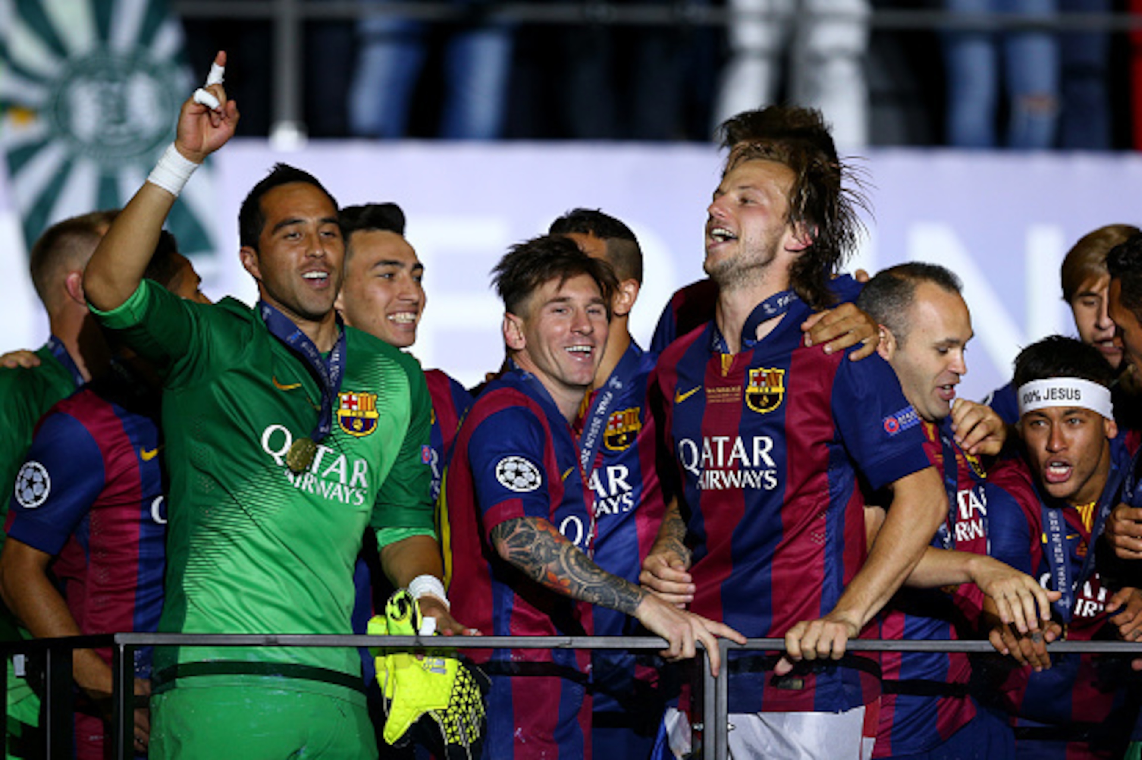 BERLIN, GERMANY - JUNE 06: Claudio Bravo, Lionel Messi and Ivan Rakitic of Barcelona celebrate victory after the UEFA Champions League Final between Juventus and FC Barcelona at Olympiastadion on June 6, 2015 in Berlin, Germany.  (Photo by Paul Gilham/Get