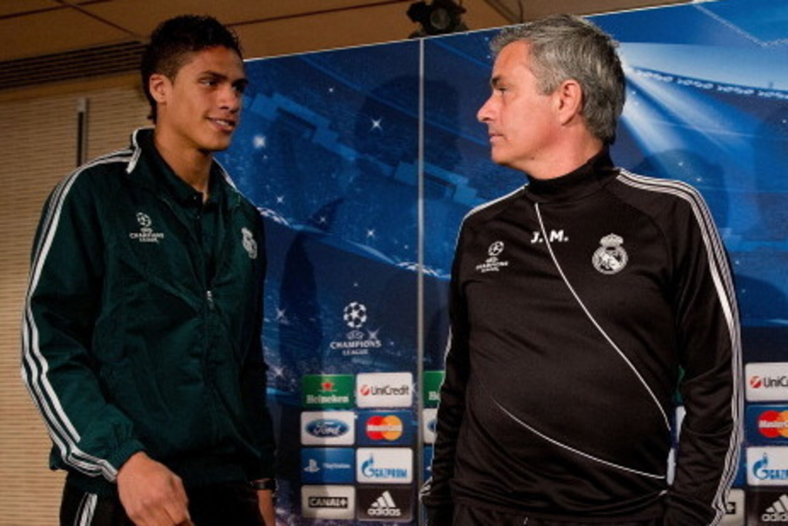 MADRID, SPAIN - APRIL 02:  Head coach Jose Mourinho (R) and Real madrid player Raphael varane prior to start a press conference ahead of the UEFA Champions League Quarterfinal match between Real Madrid and Galatasaray AS at Santiago Bernabeu Stadium on Ap