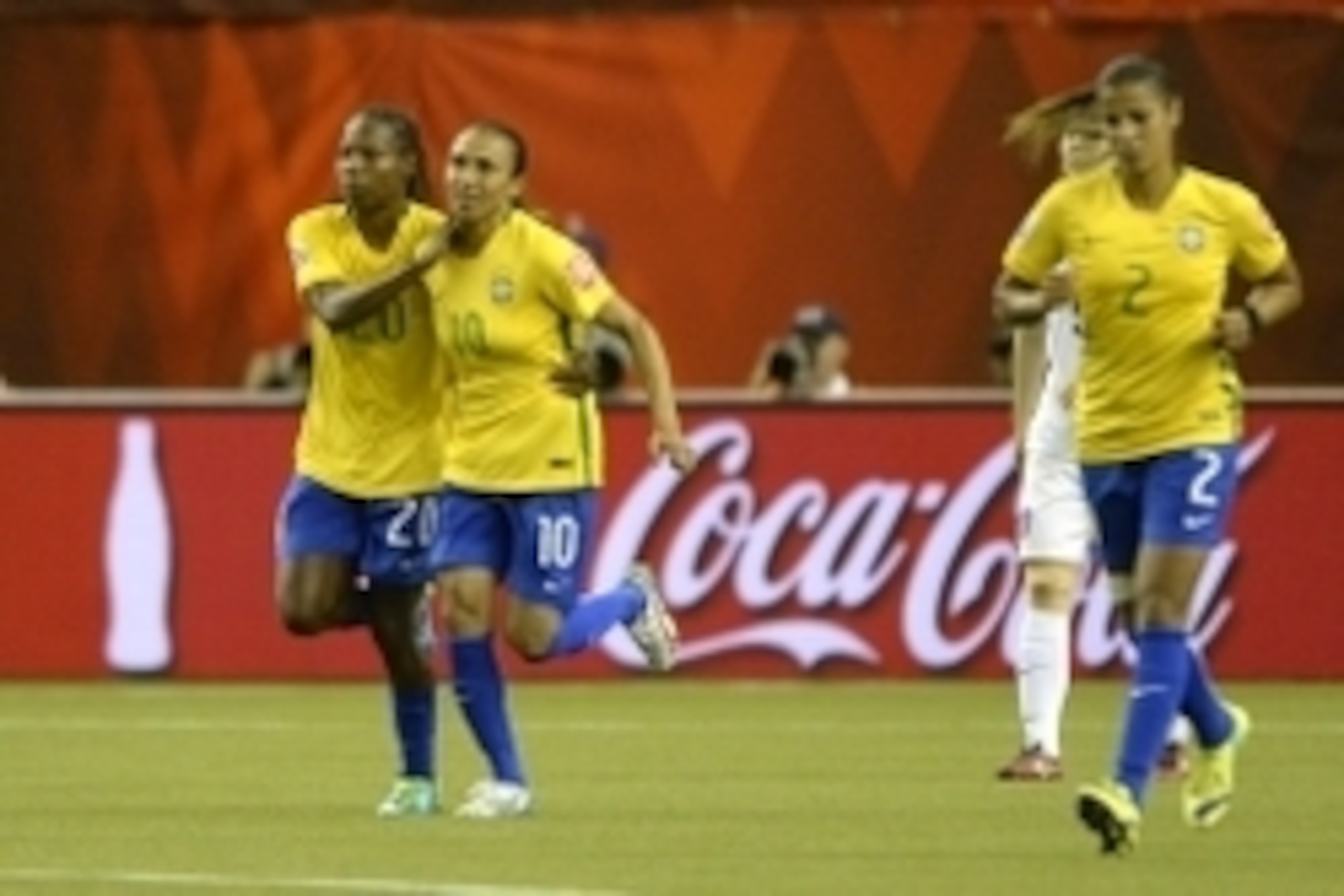 Jun 9, 2015; Montreal, Quebec, CAN; Brazil midfielder Marta (10) is congratulated by Brazil midfielder Formiga (20) after successfully converting a penalty kick for a goal against Korea Republic in the second half a Group E soccer match in the 2015 FIFA w