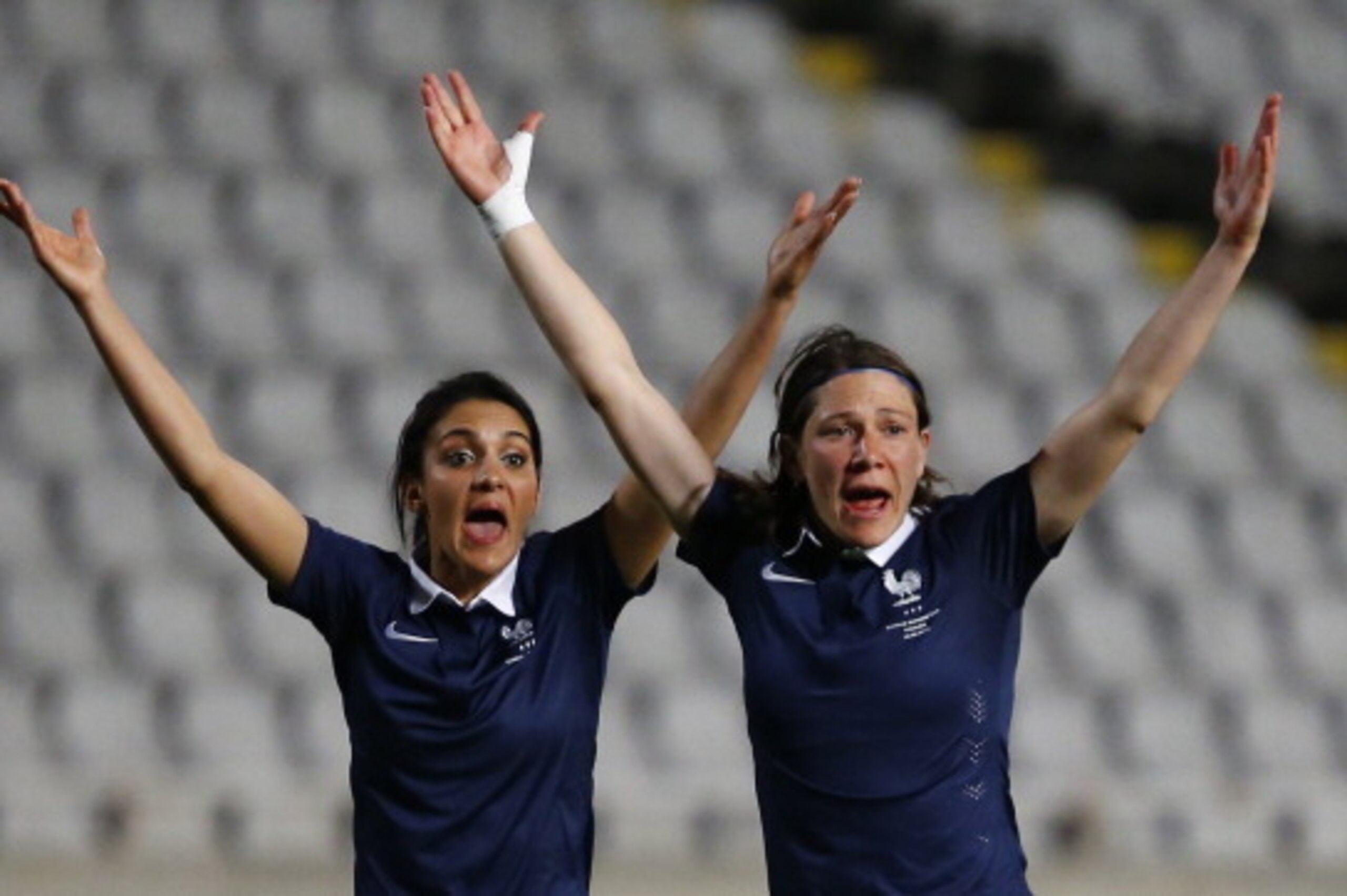 NICOSIA, CYPRUS - MARCH 12: Elisa Bussaglia (R) and Louisa Necib of France react during the Cyprus cup final between England an France at GSP stadium on March 12, 2014 in Nicosia, Cyprus.  (Photo by Andrew Caballero-Reynolds/Getty Images)