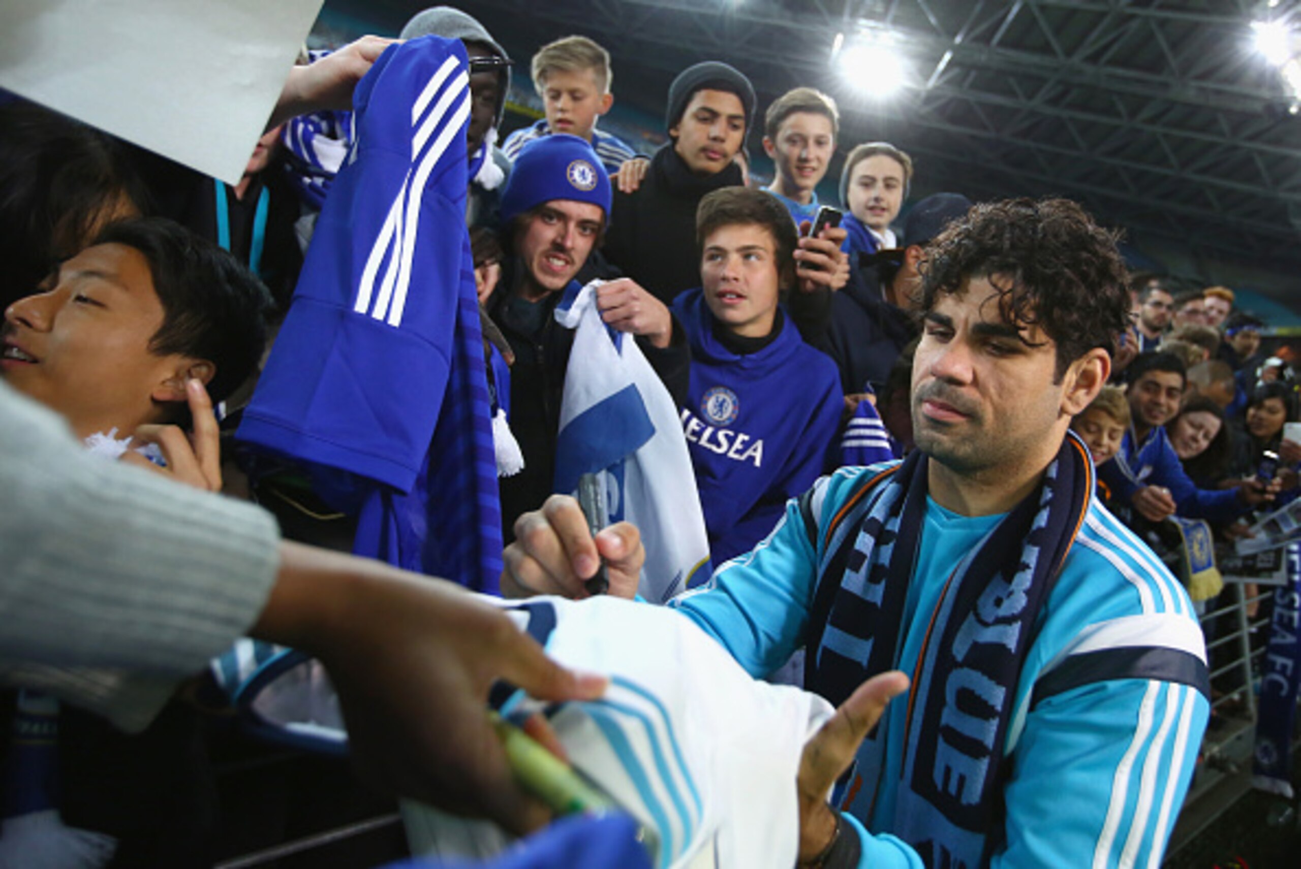 SYDNEY, AUSTRALIA - JUNE 02:  Diego Costa of Chelsea signs autographs after the international friendly match between Sydney FC and Chelsea FC at ANZ Stadium on June 2, 2015 in Sydney, Australia.  (Photo by Mark Kolbe/Getty Images)