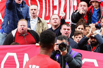 STOKE ON TRENT, ENGLAND - MAY 24:  Liverpool fans react towards Raheem Sterling prior to the Barclays Premier League match between Stoke City and Liverpool at Britannia Stadium on May 24, 2015 in Stoke on Trent, England.  (Photo by Dave Thompson/Getty Ima