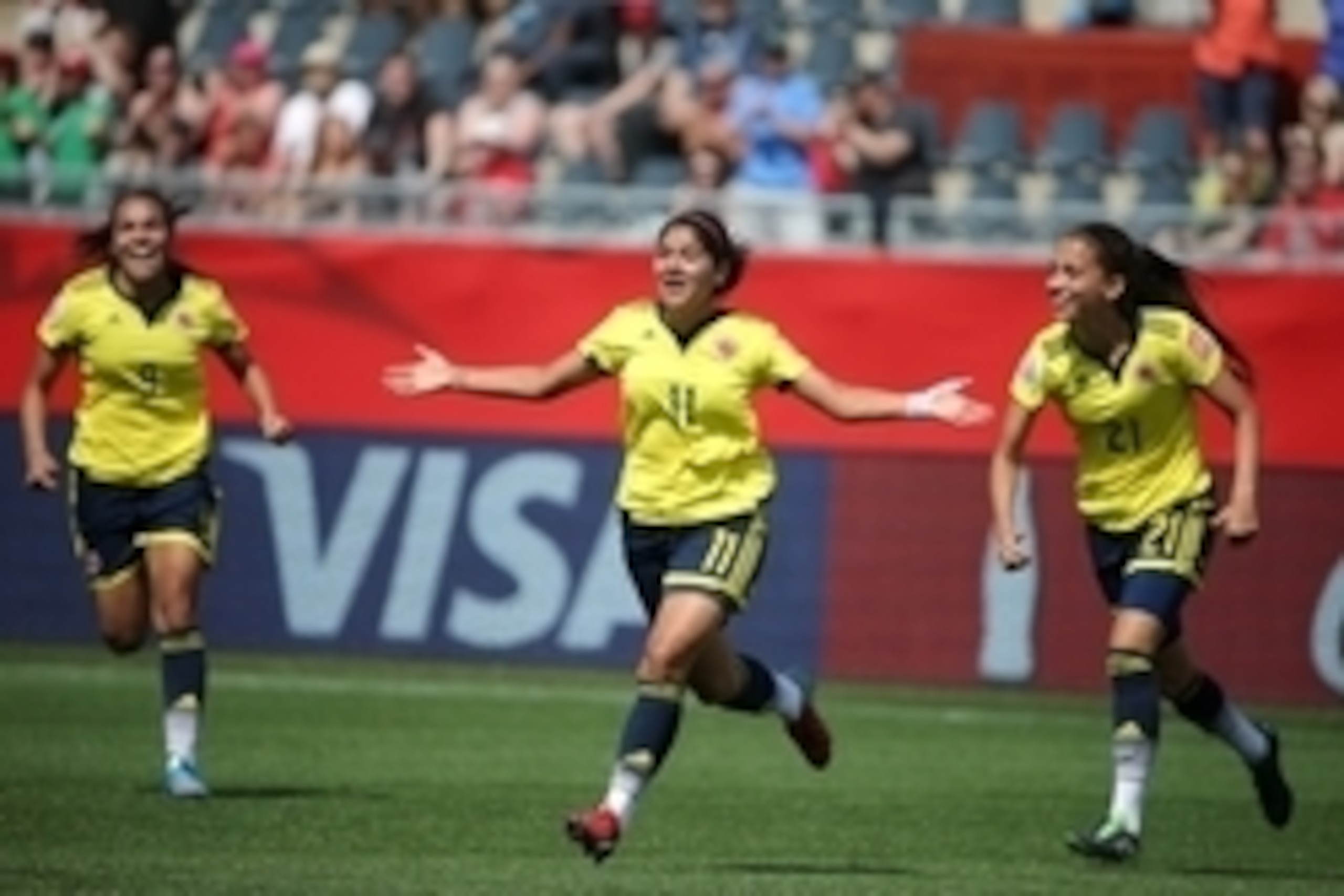 Jun 13, 2015; Moncton, New Brunswick, CAN; Colombia midfielder Catalina Usme (11) celebrates after scoring a goal during stoppage time against France in a Group F soccer match in the 2015 FIFA women's World Cup at Moncton Stadium. Colombia wins 2-0. Manda