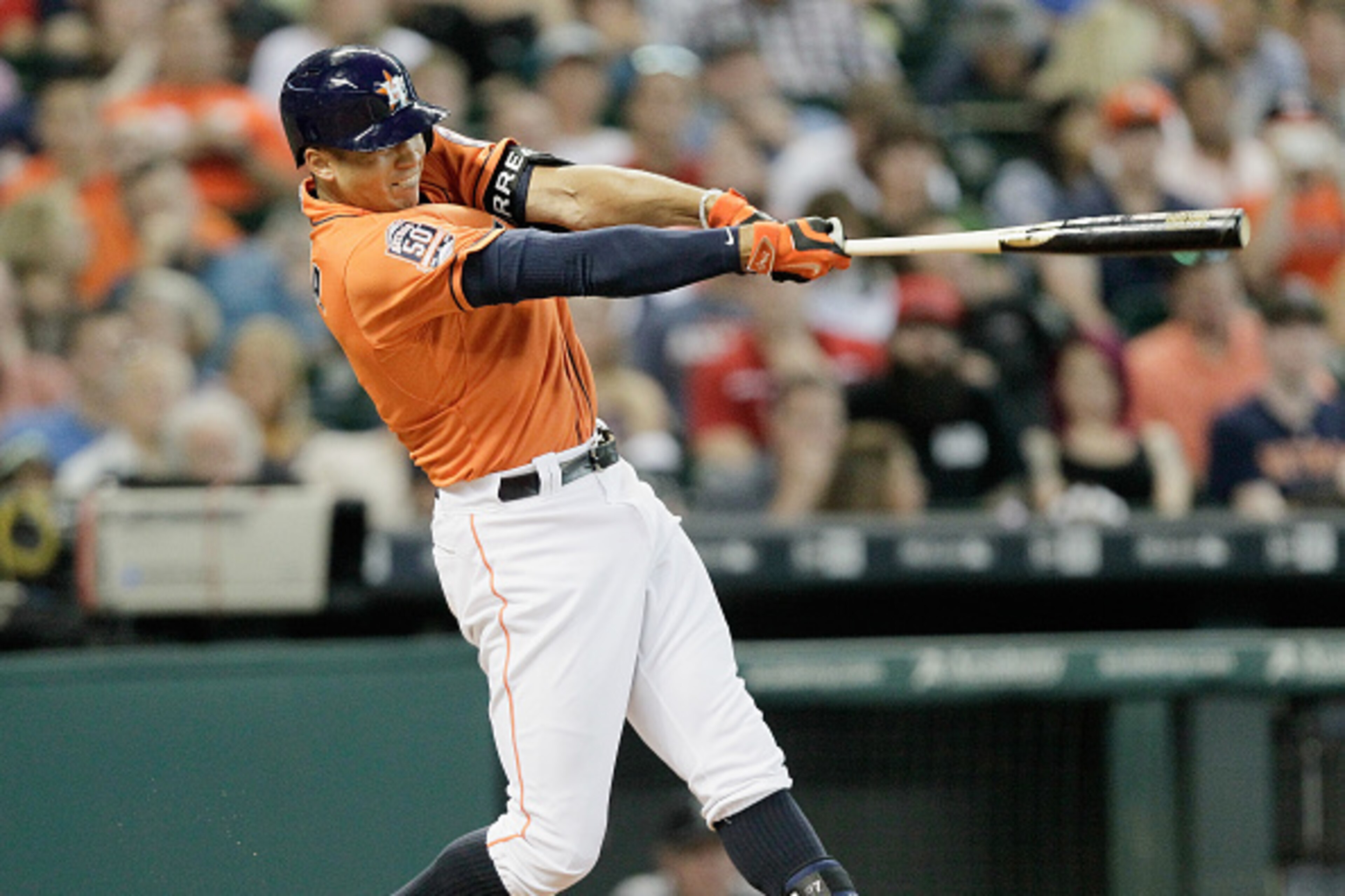 HOUSTON, TX - JUNE 12:  Carlos Correa #1 of the Houston Astros hits a home run in the second inning against the Seattle Mariners at Minute Maid Park on June 12, 2015 in Houston, Texas.  (Photo by Bob Levey/Getty Images)
