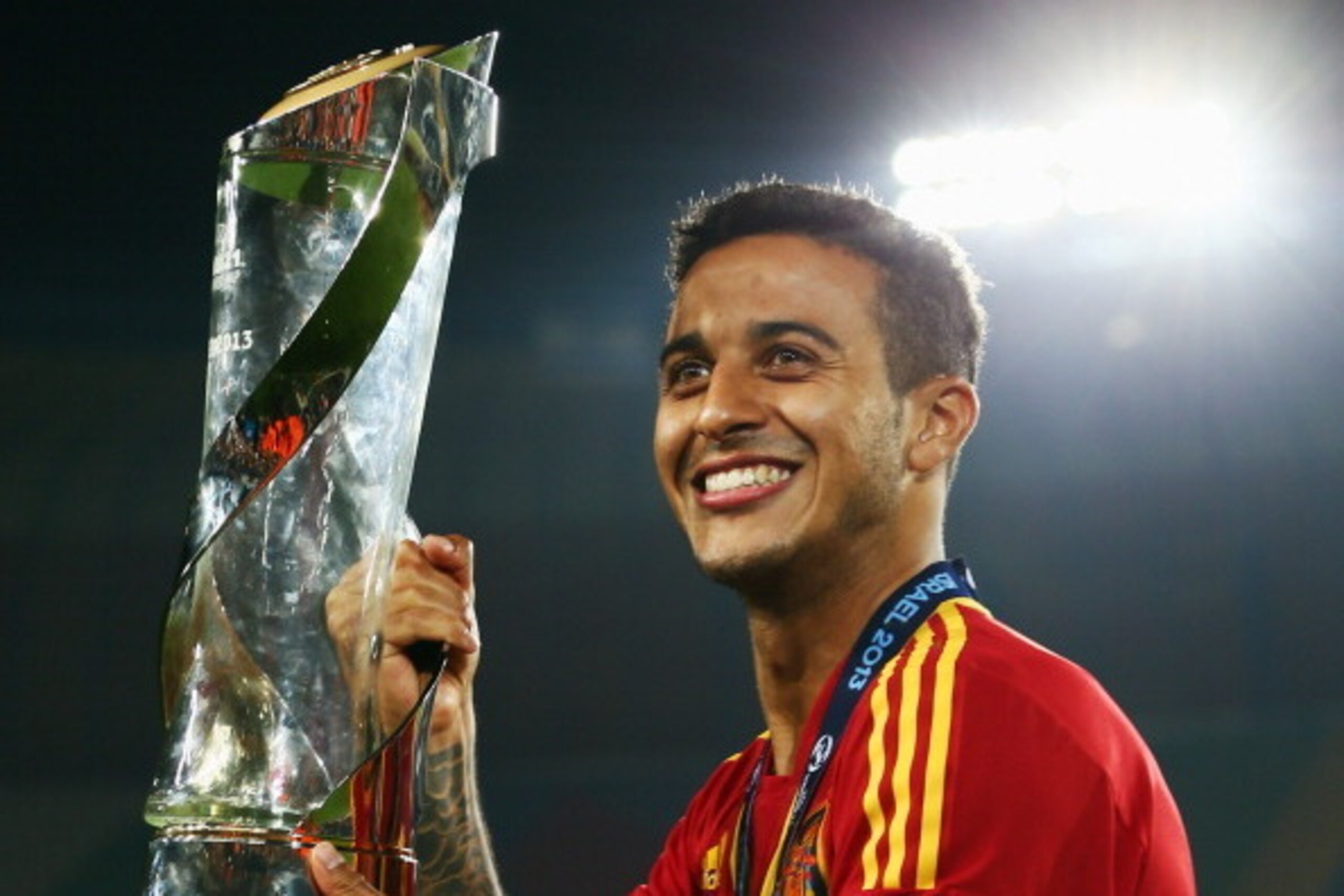 JERUSALEM, ISRAEL - JUNE 18:  Thiago Alcantara of Spain poses with the trophy after winning the UEFA European U21 Championship final match against Italy at Teddy Stadium on June 18, 2013 in Jerusalem, Israel.  (Photo by Alex Grimm/Getty Images)
