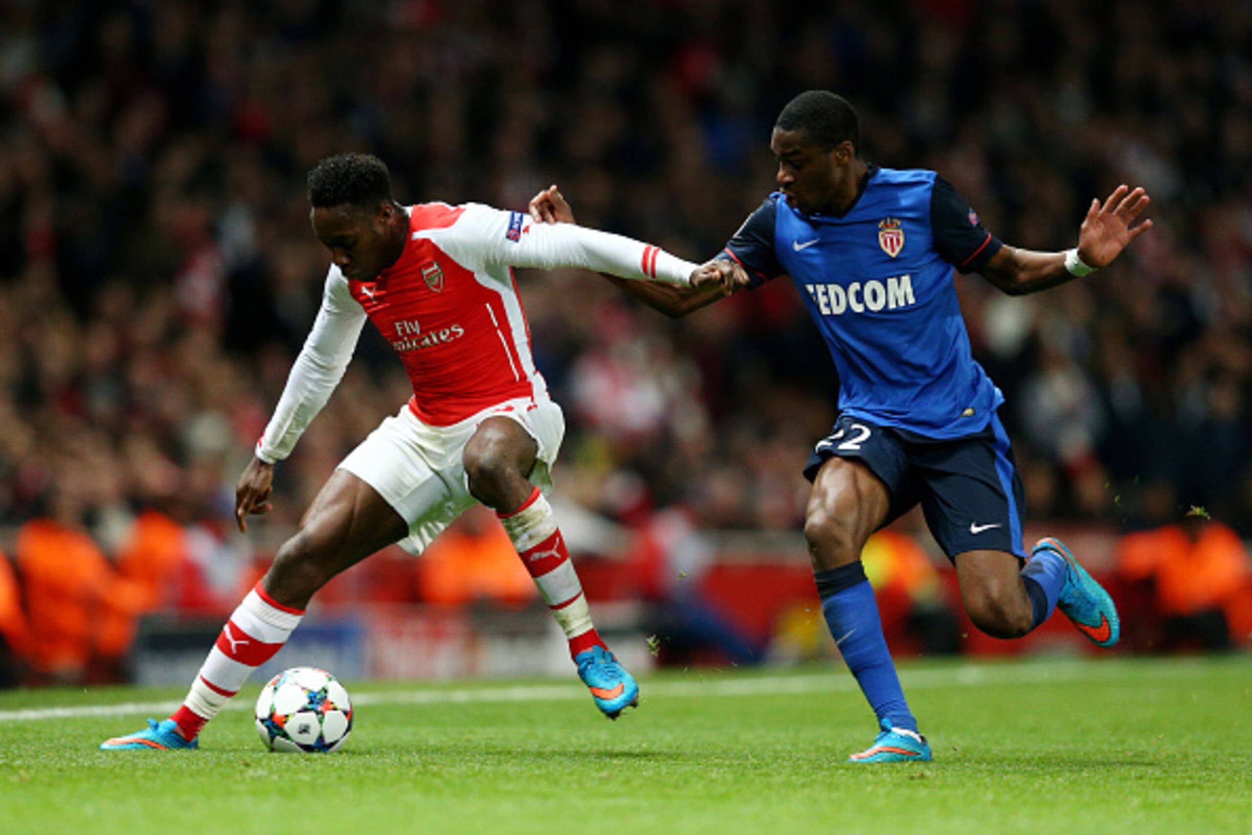 LONDON, ENGLAND - FEBRUARY 25:  Danny Welbeck of Arsenal and Geoffrey Kondogbia of Monaco battle for the ball during the UEFA Champions League round of 16, first leg match between Arsenal and Monaco at The Emirates Stadium on February 25, 2015 in London, 
