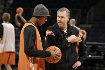 MILWAUKEE - JANUARY 26:  Raja Bell #19 of the Phoenix Suns listens to head coach Mike D'Antoni during practice before the game against the Milwaukee Bucks at the Bradley Center on January 26, 2007 in Milwaukee, Wisconsin. The Suns won 98-90. NOTE TO USER: