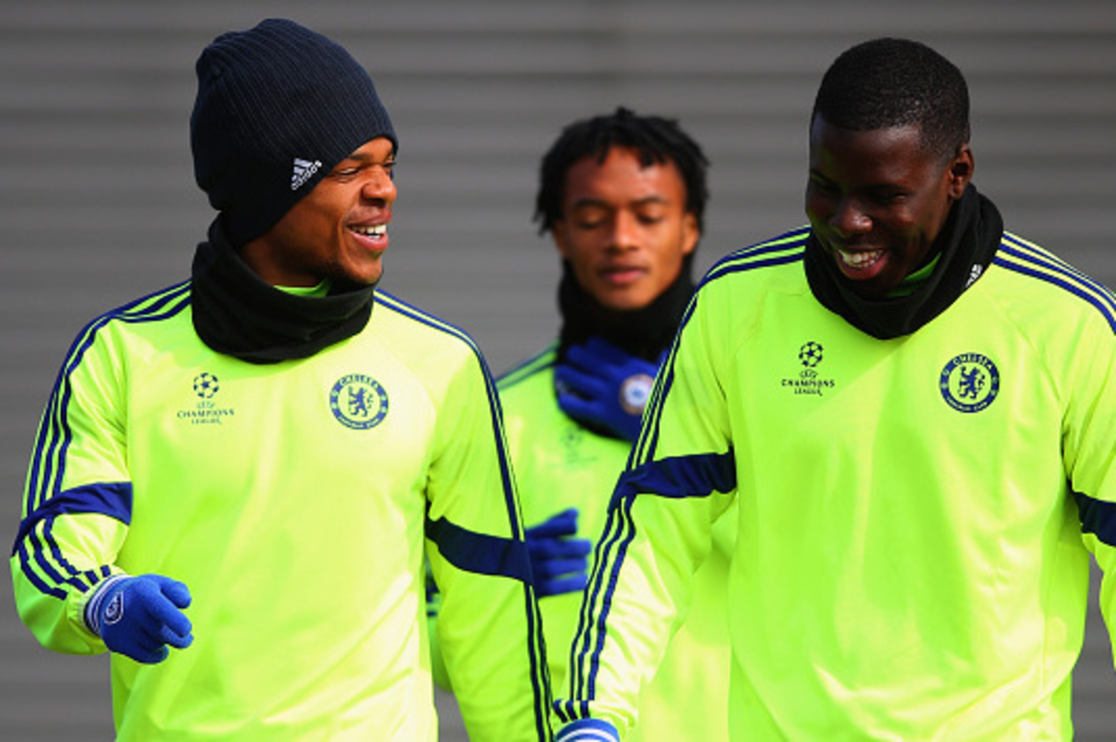 COBHAM, ENGLAND - MARCH 10:  Loic Remy (L) and Kurt Zouma in discussion during a Chelsea training session ahead of the UEFA Champions League Round of 16 second leg match against Paris Saint-Germain at Chelsea Training Ground on March 10, 2015 in Cobham, E