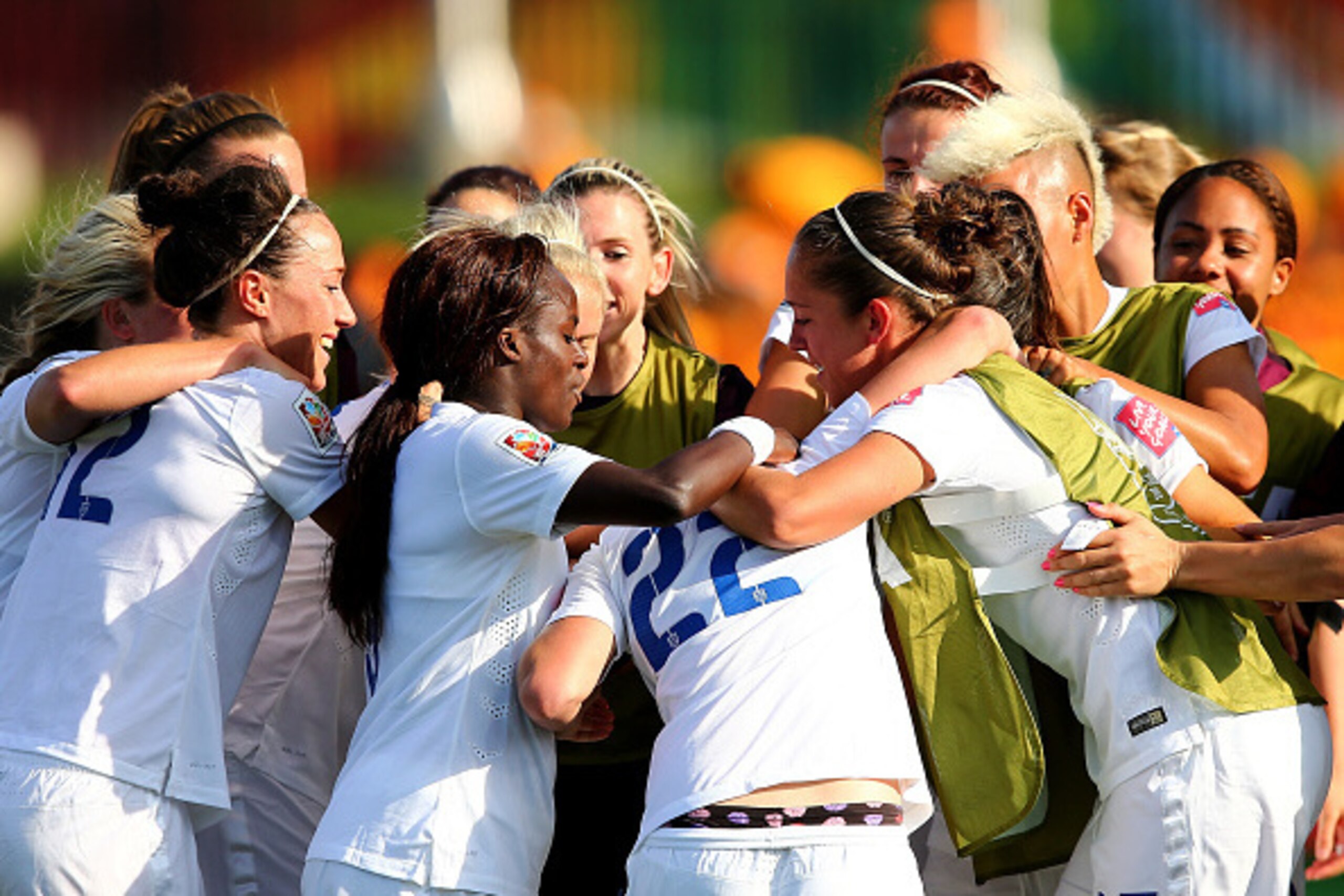 MONCTON, NB - JUNE 13:  Fran Kirby #22 of England is surrounded by her teammates after she scored in the second half against Mexico during the FIFA Women's World Cup 2015 Group F match at Moncton Stadium on June 13, 2015 in Moncton, Canada.  (Photo by Els