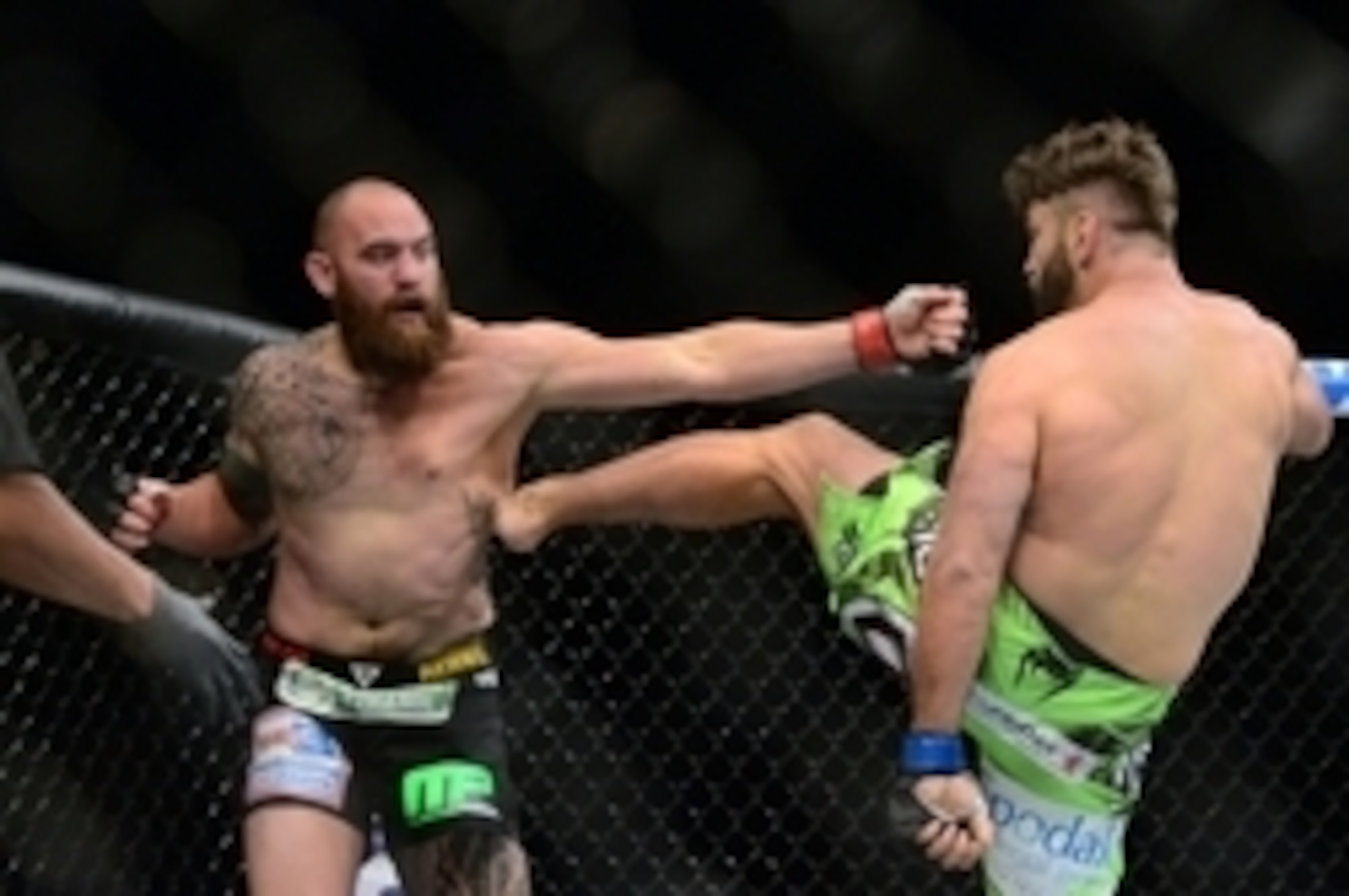 May 23, 2015; Las Vegas, NV, USA; Travis Browne (red gloves) and Andei Arlovski (blue gloves) fight during their heavyweight bout during UFC 187 at MGM Grand Garden Arena. Arlovski won via first round TKO. Mandatory Credit: Joe Camporeale-USA TODAY Sports